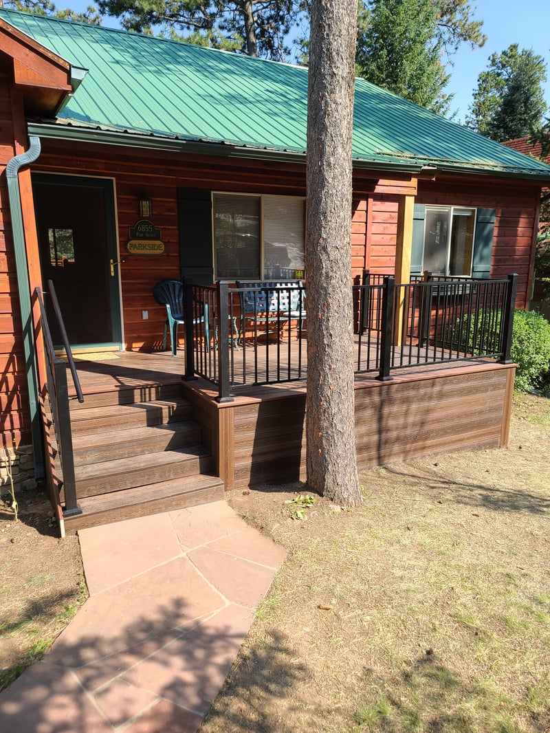 Deck stairs with landing and matching railings