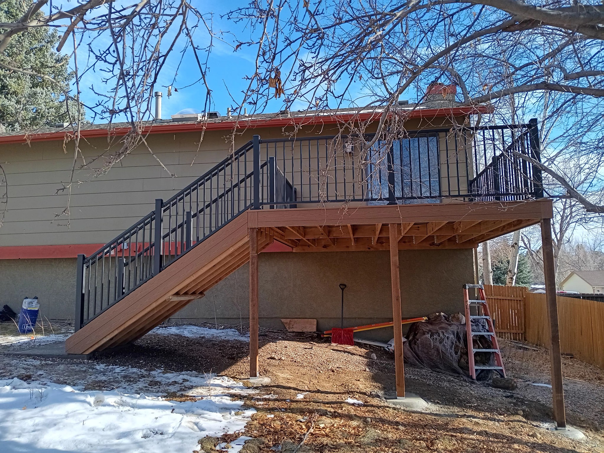 Wraparound custom deck with built-in bench seating