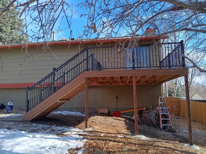 Wraparound custom deck with built-in bench seating