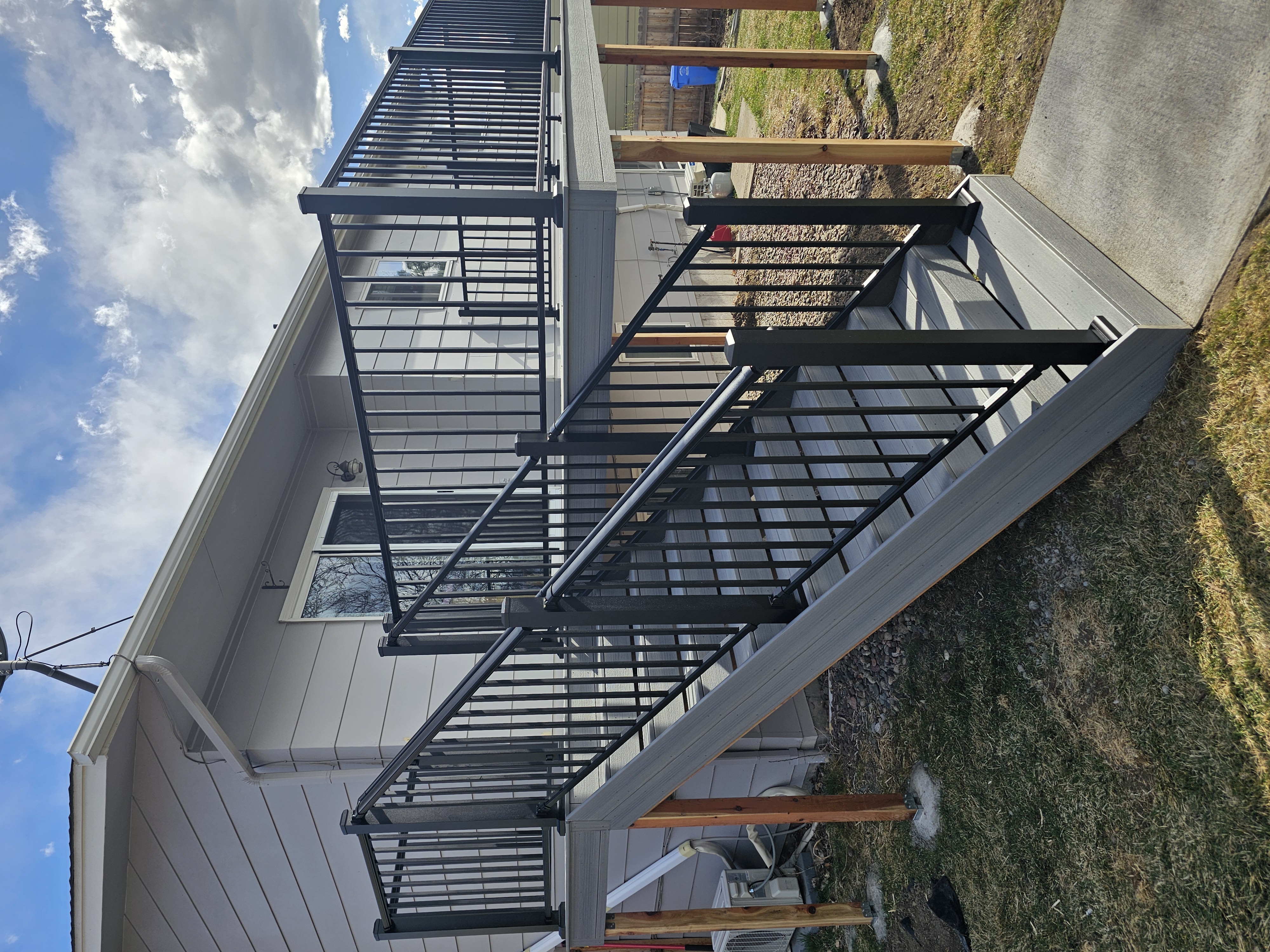 Covered outdoor kitchen and dining deck