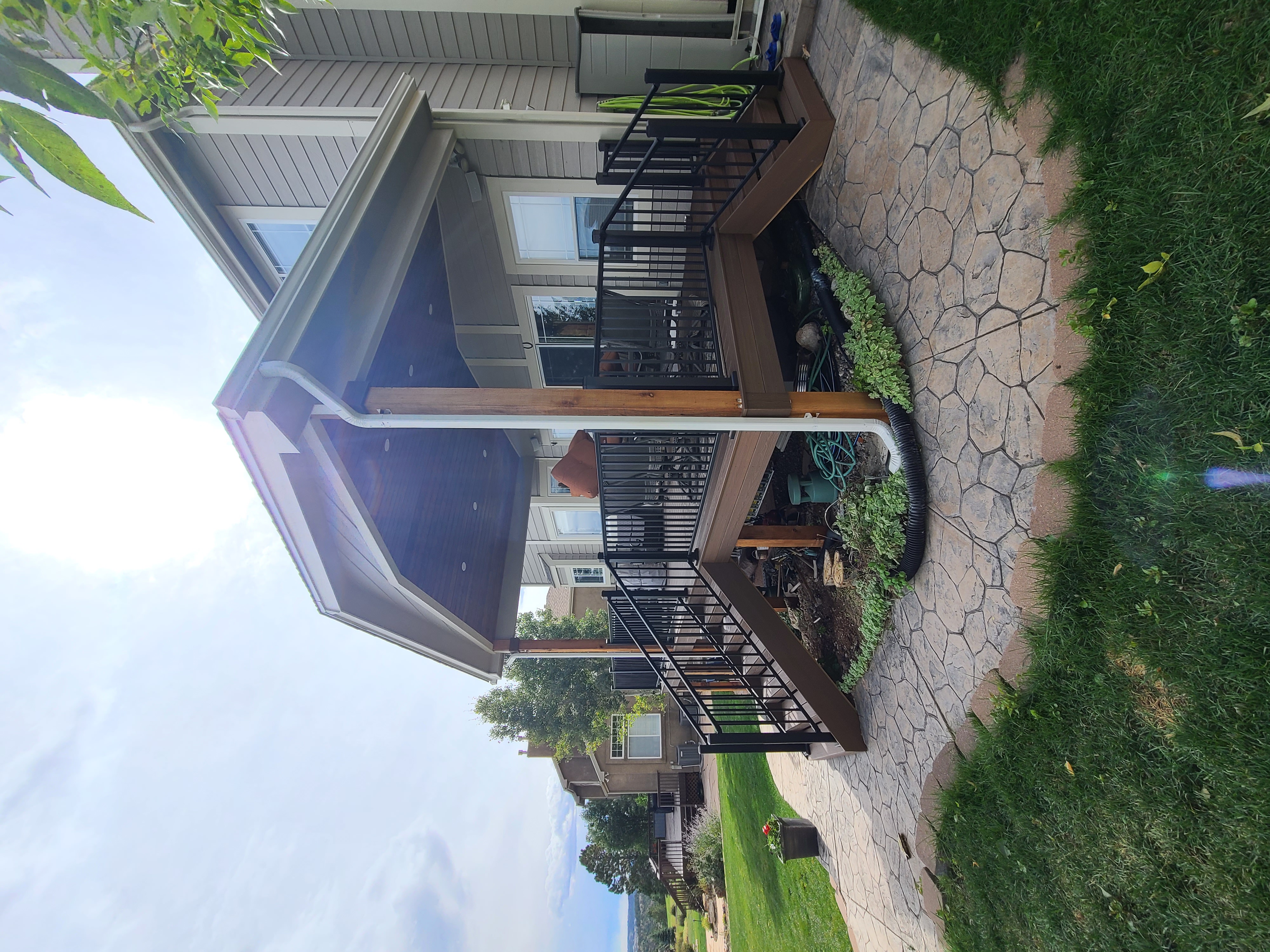 Covered outdoor kitchen and dining deck