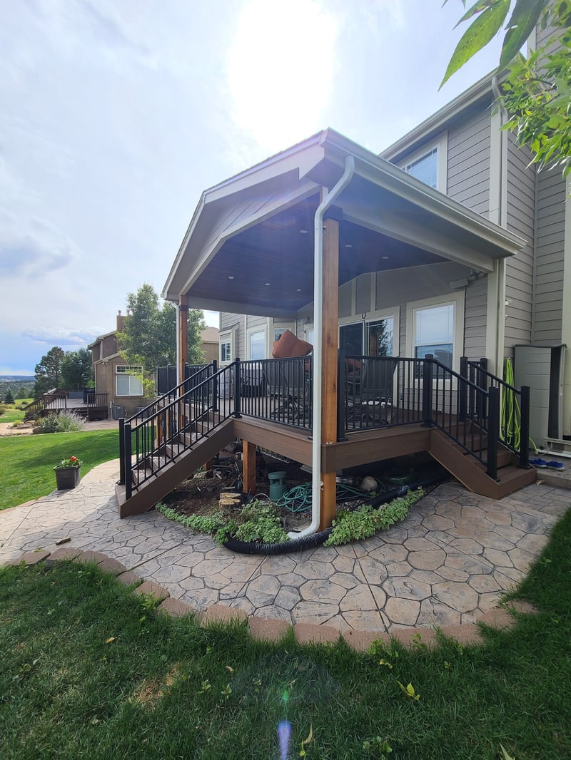 Covered outdoor kitchen and dining deck