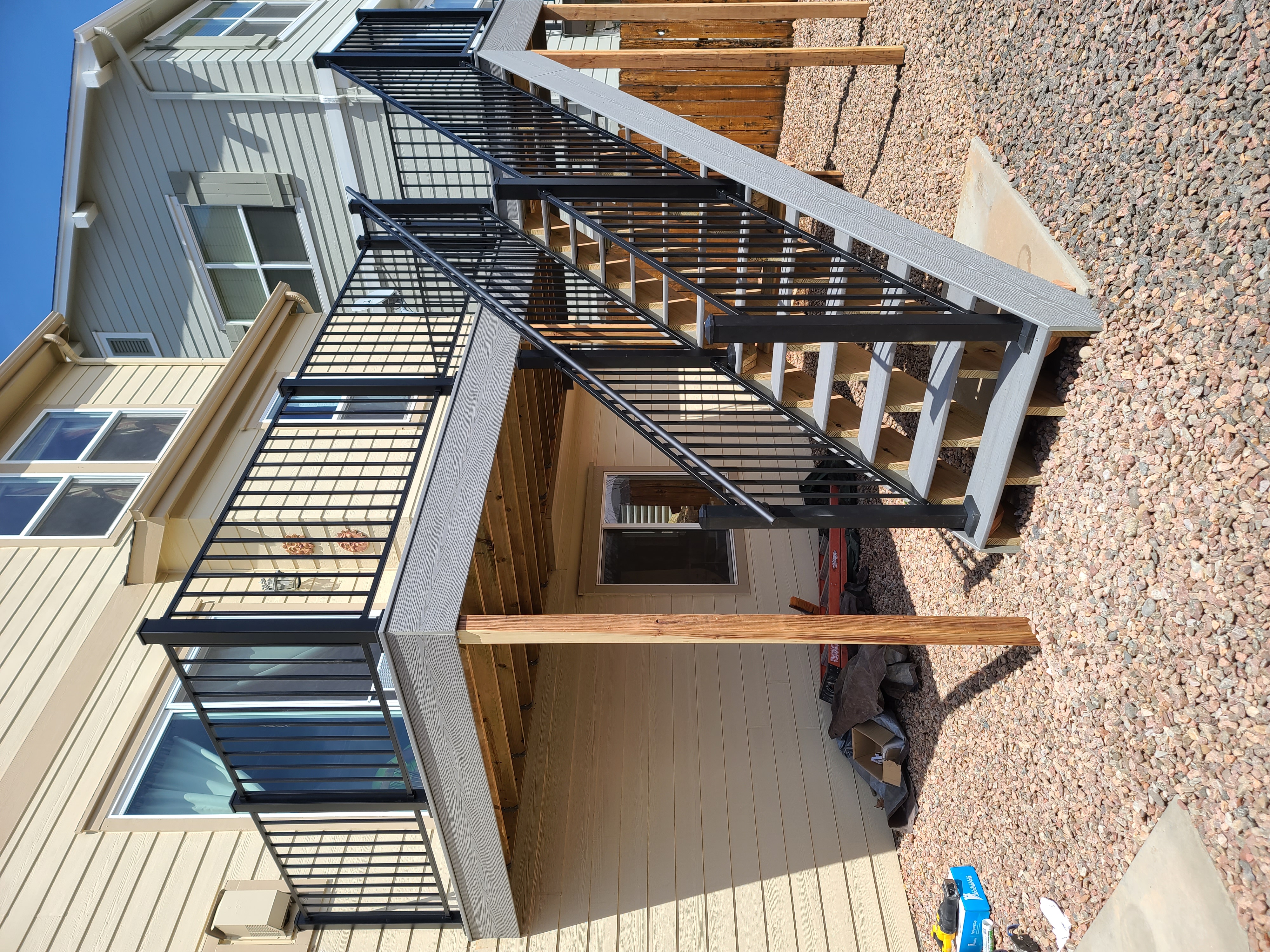 Finished composite deck with picture-frame border detail