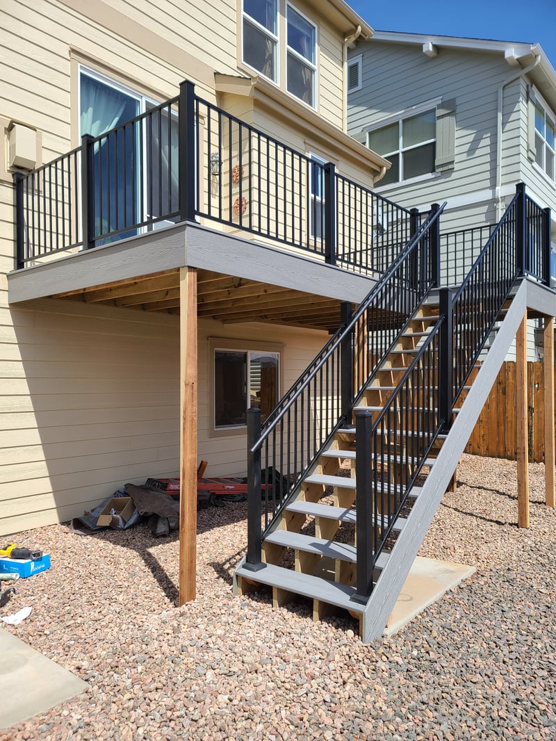 Finished composite deck with picture-frame border detail