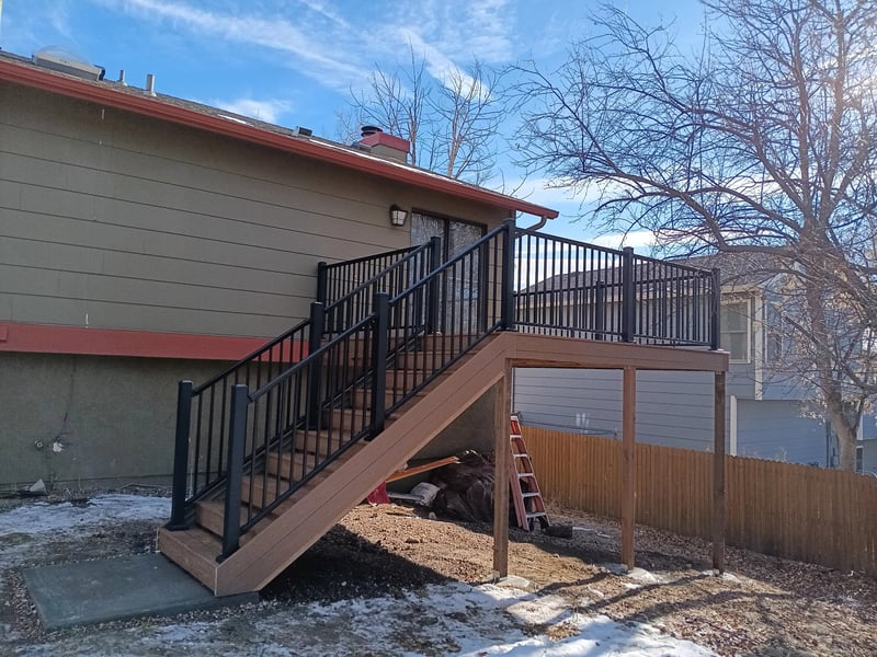 Deck stairs with landing and matching railings