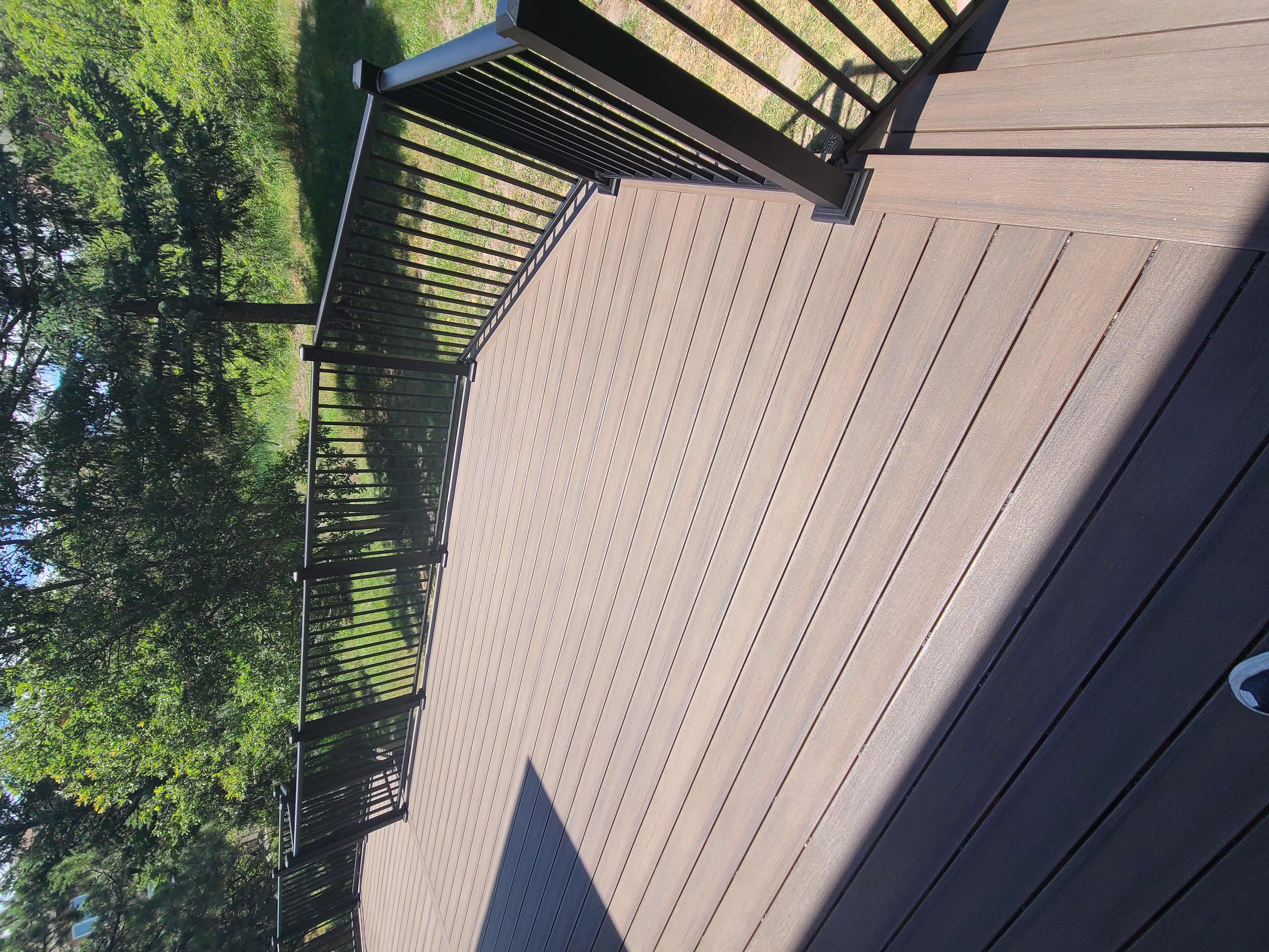 Deck stairs with landing and matching railings