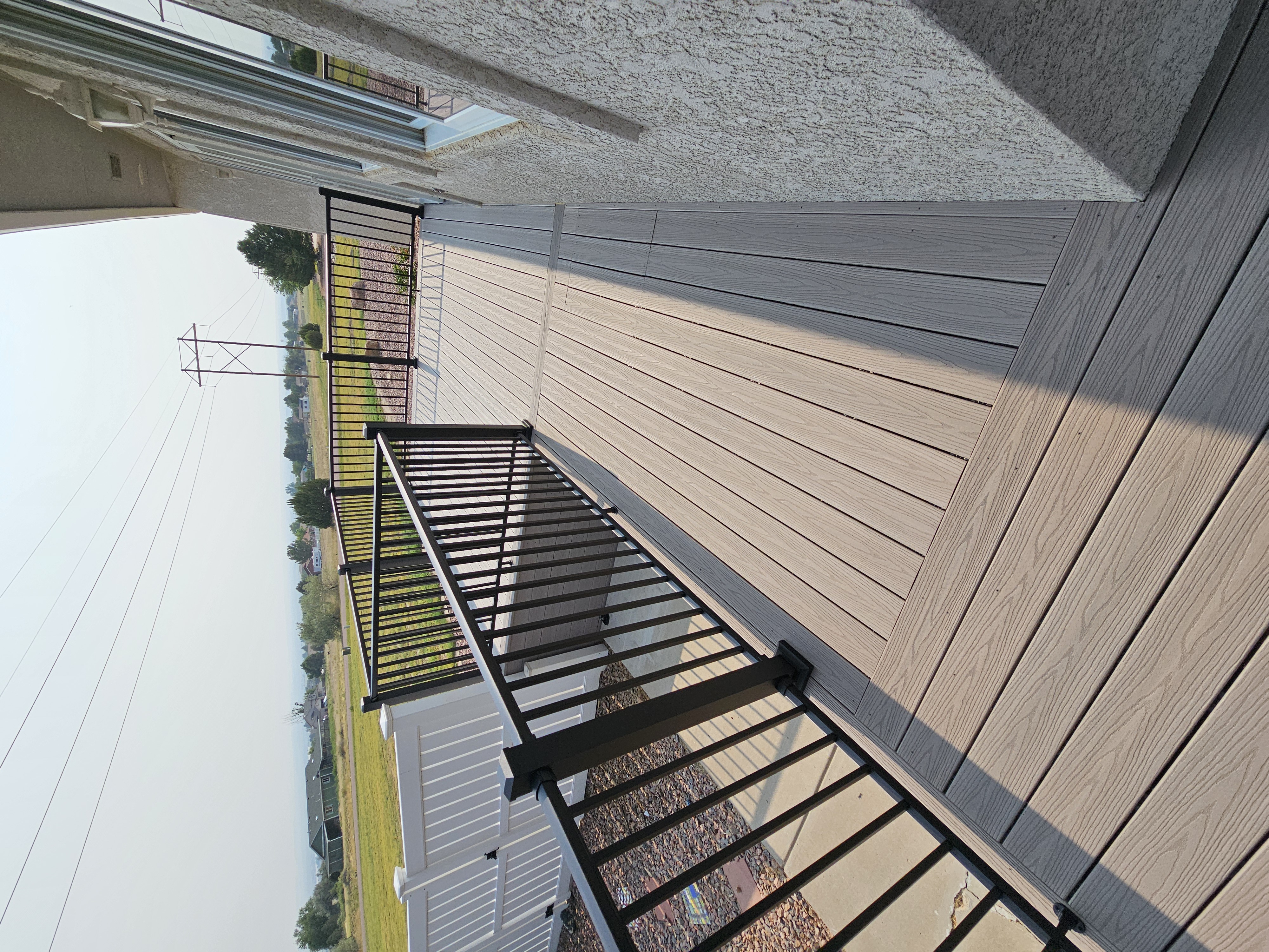 Wraparound custom deck with built-in bench seating