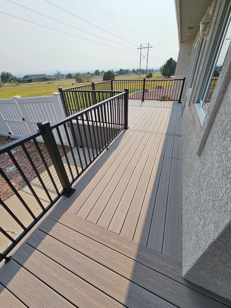 Wraparound custom deck with built-in bench seating