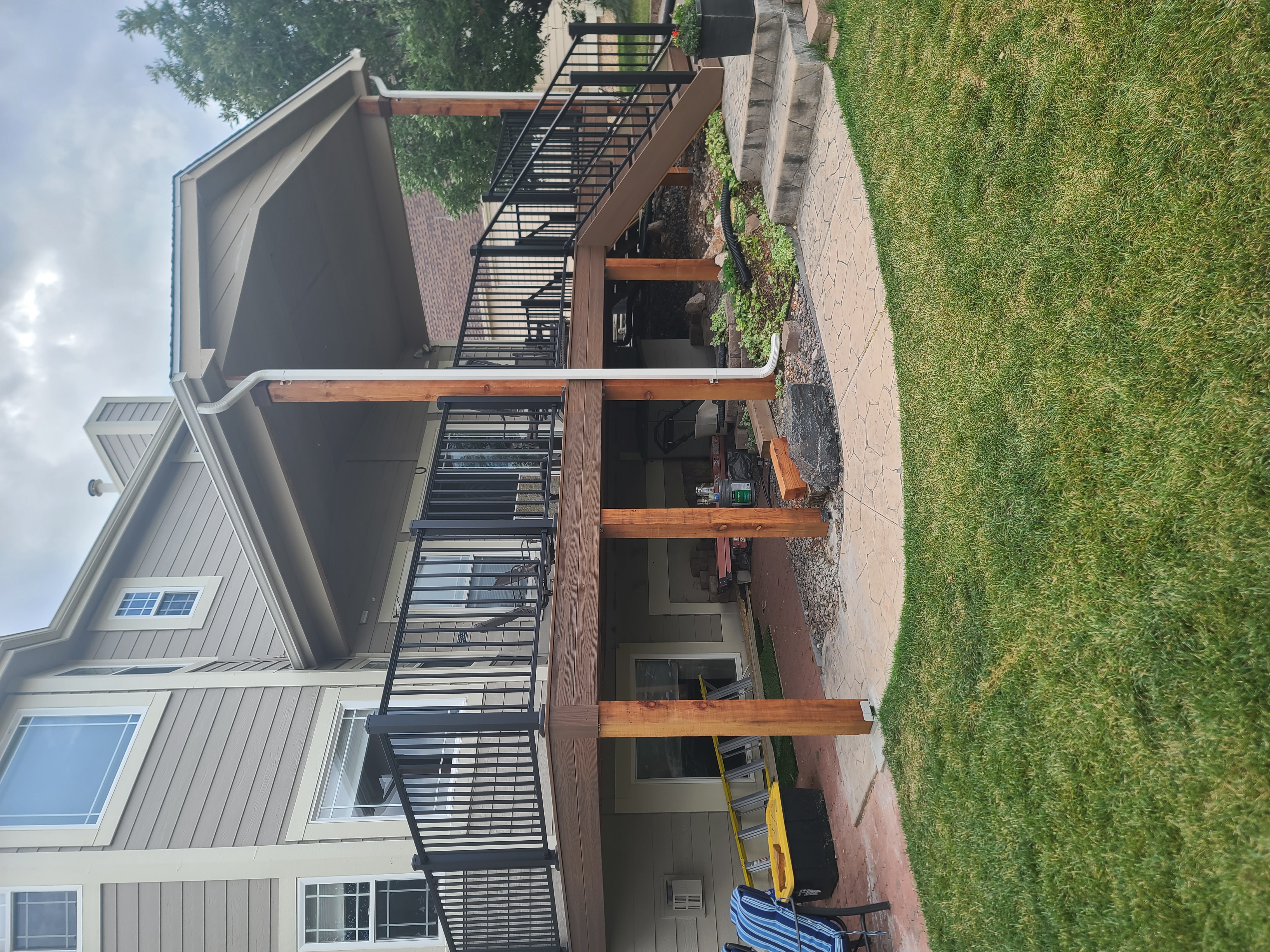 Finished composite deck with picture-frame border detail