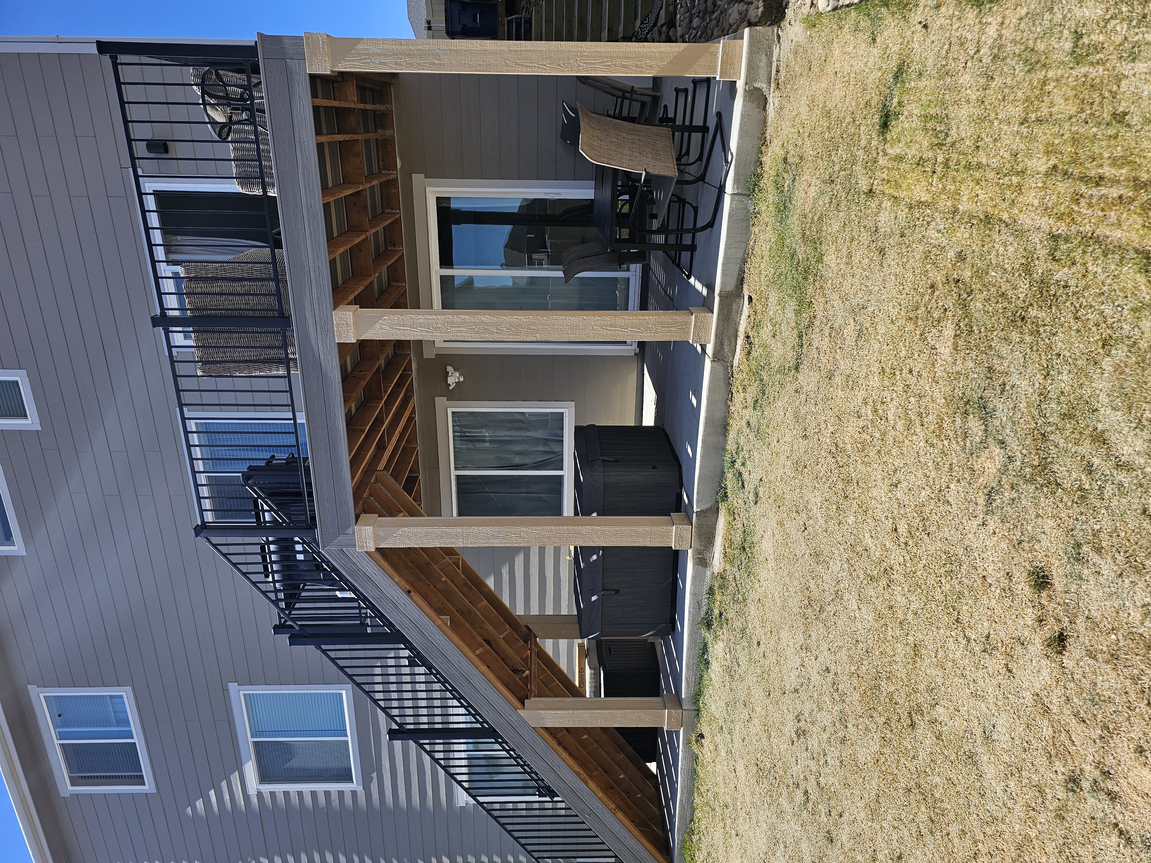 Covered outdoor kitchen and dining deck