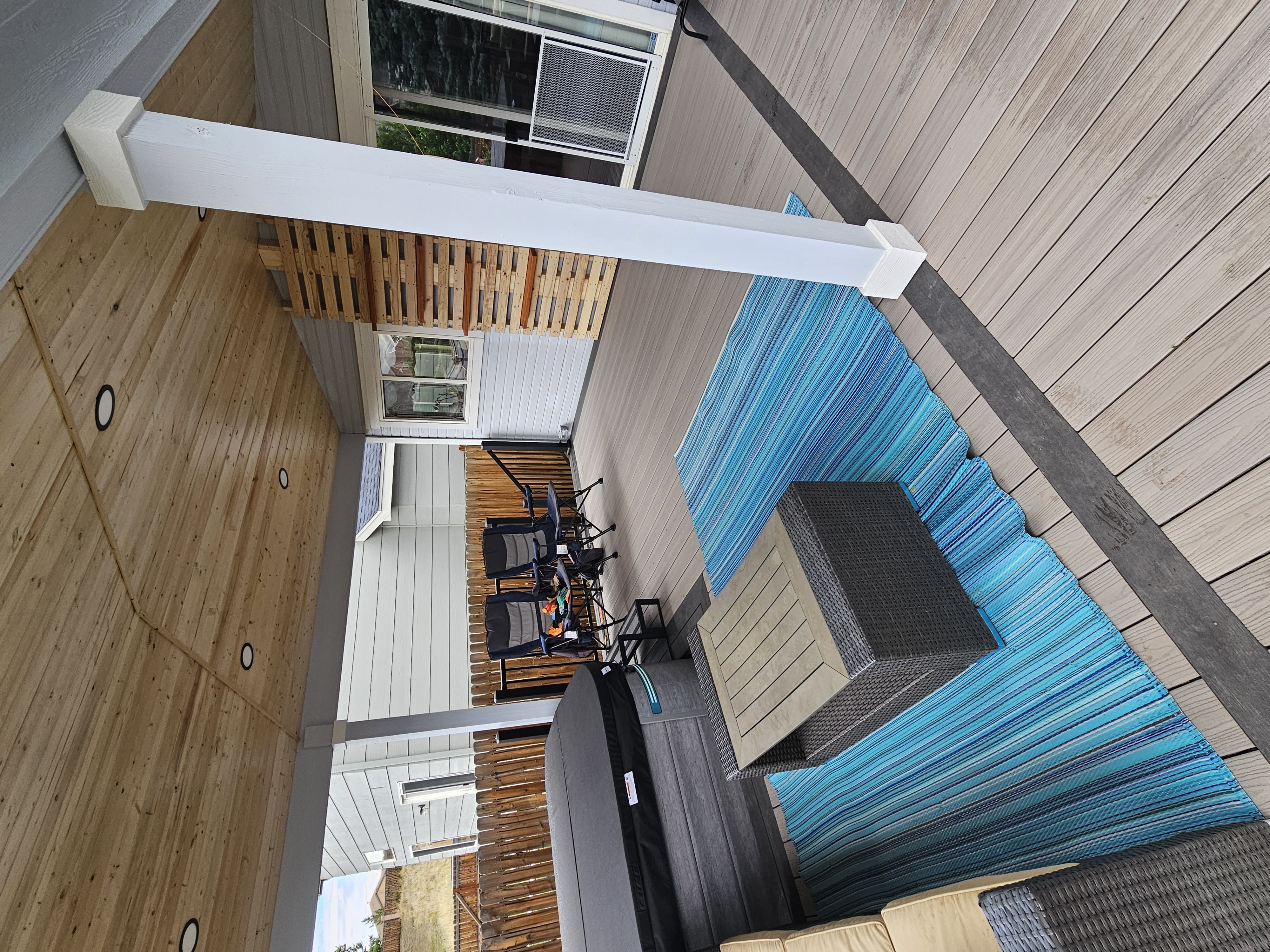 Pergola over stone patio in Peyton
