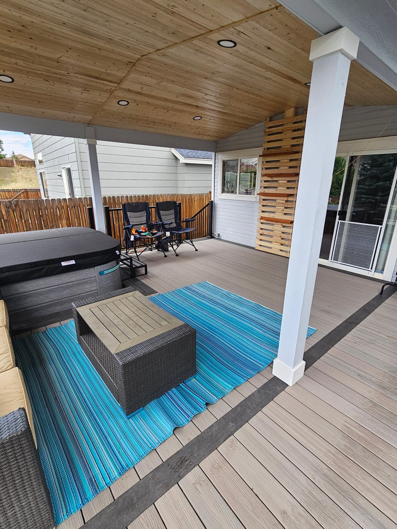 Multi-level custom wood deck with railings in Colorado Springs