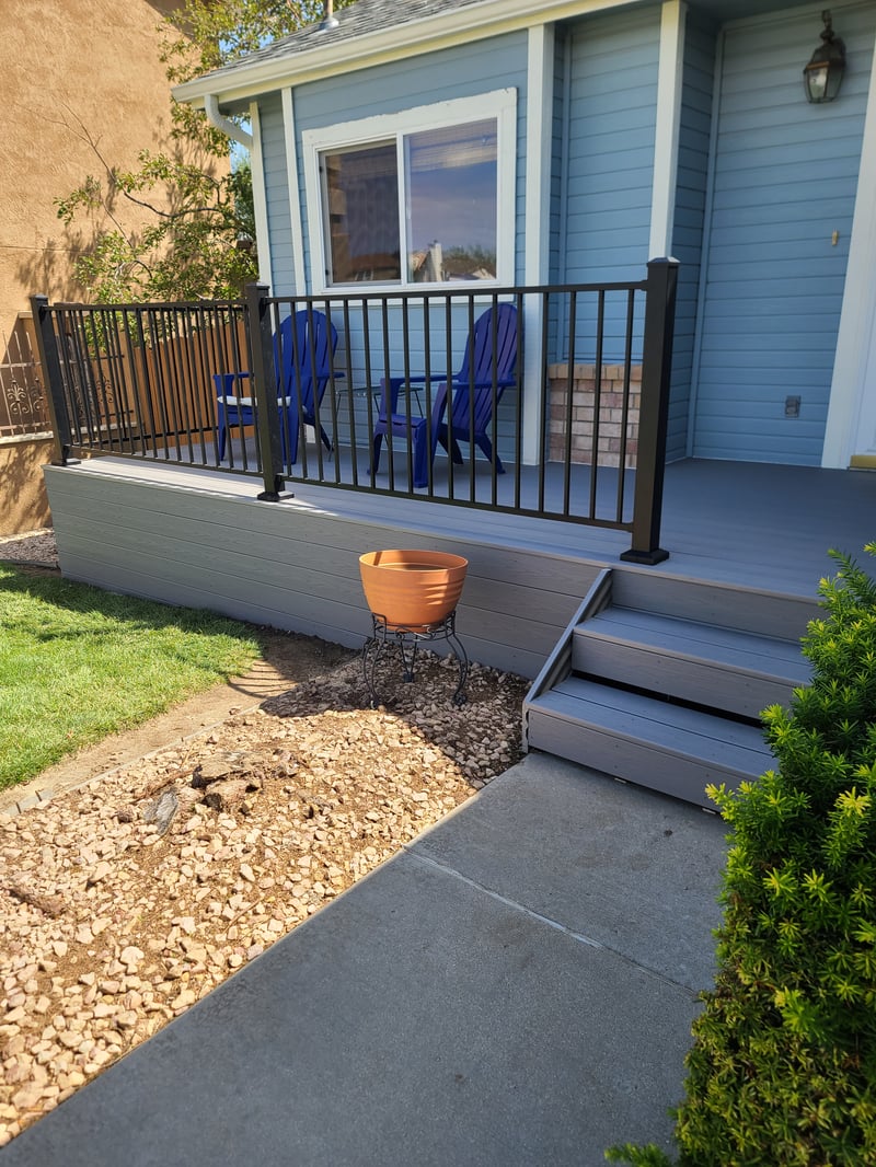 Backyard deck with pergola and outdoor dining area