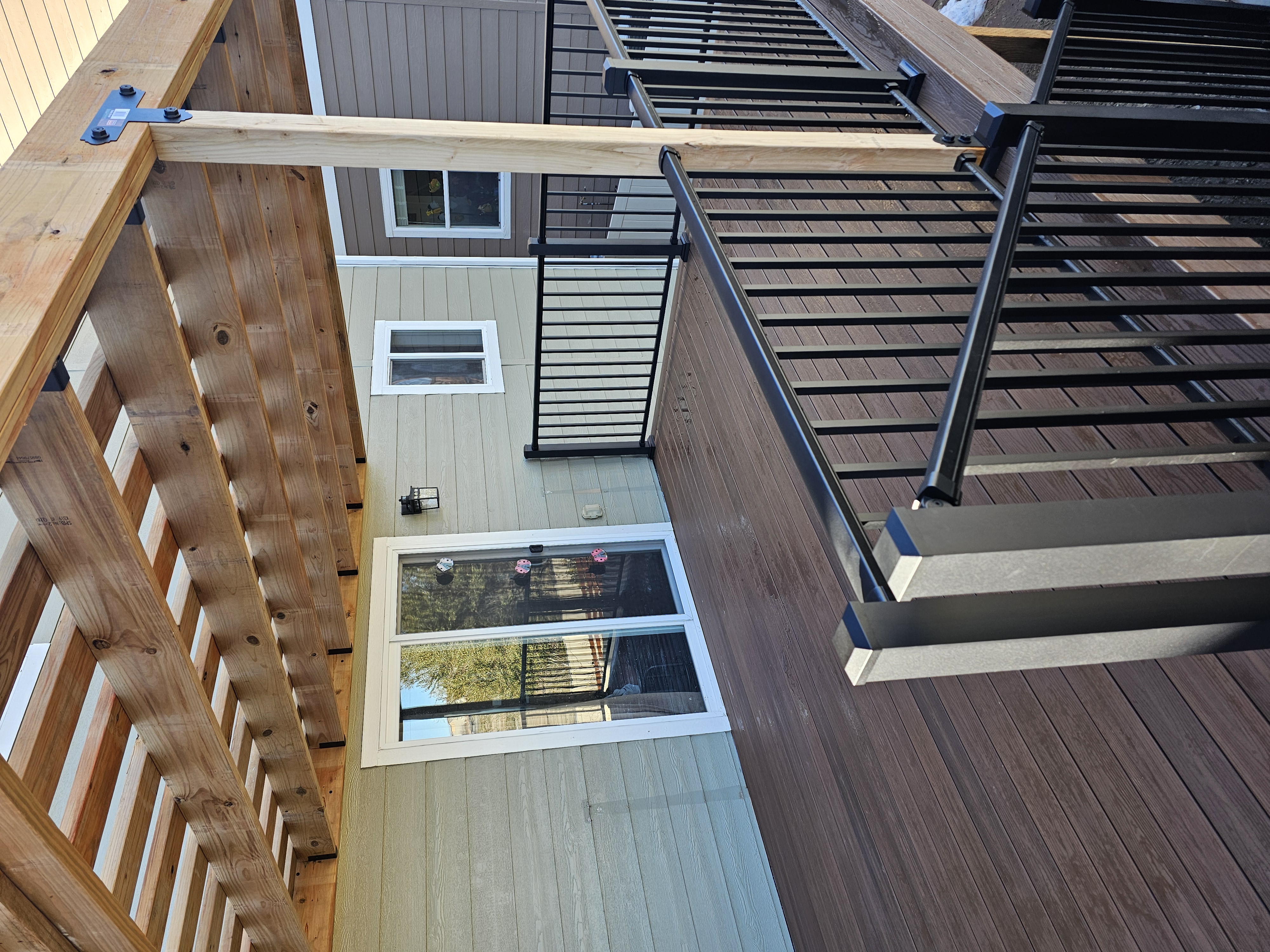Wraparound custom deck with built-in bench seating