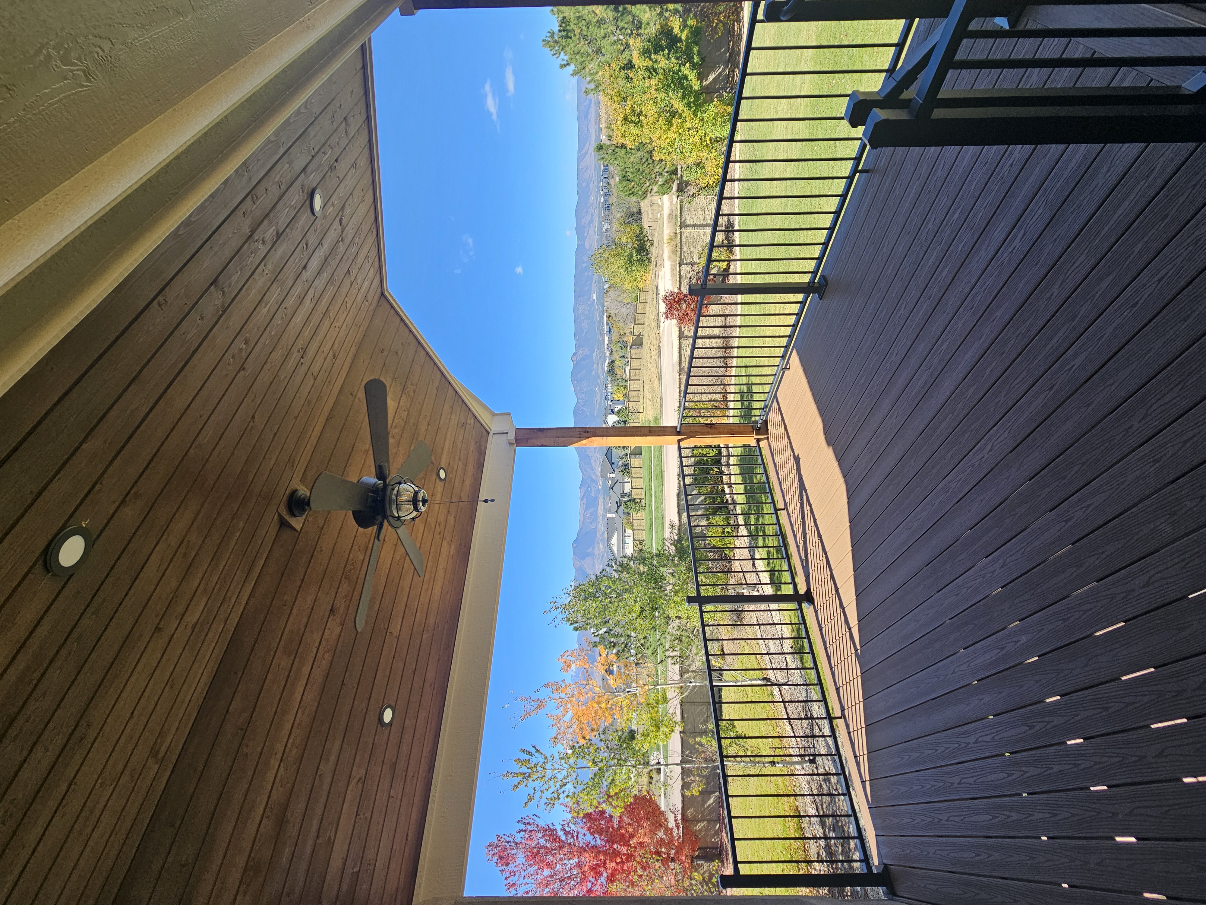 Multi-level custom wood deck with railings in Colorado Springs