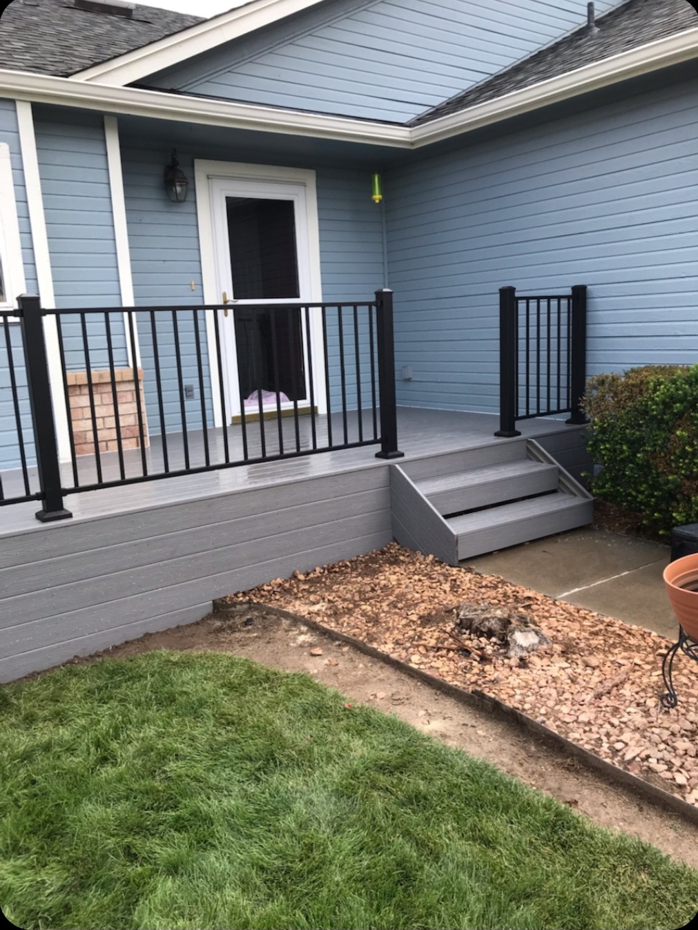 Finished composite deck with picture-frame border detail