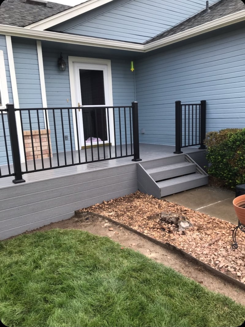 Finished composite deck with picture-frame border detail