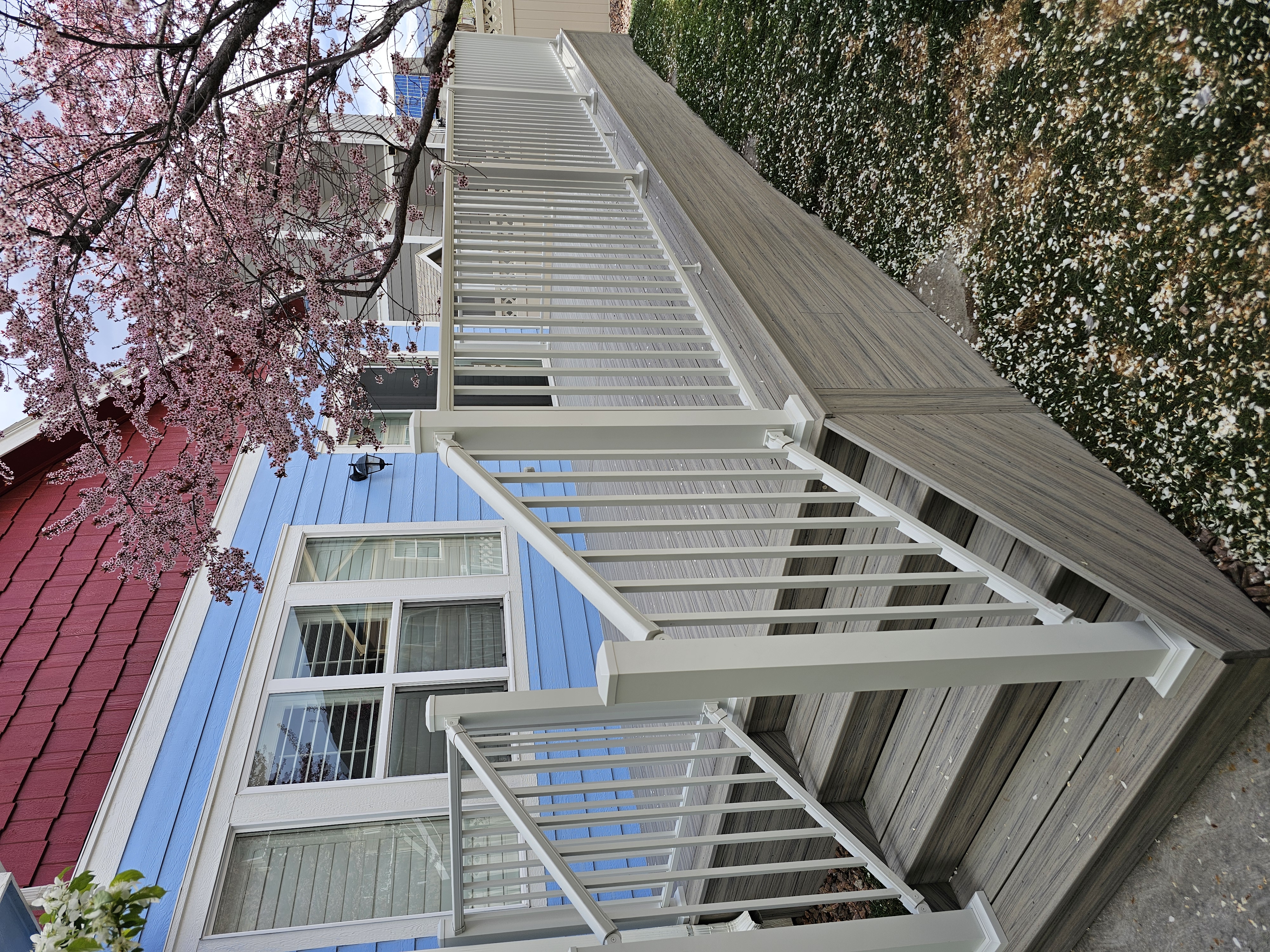 Multi-level custom wood deck with railings in Colorado Springs