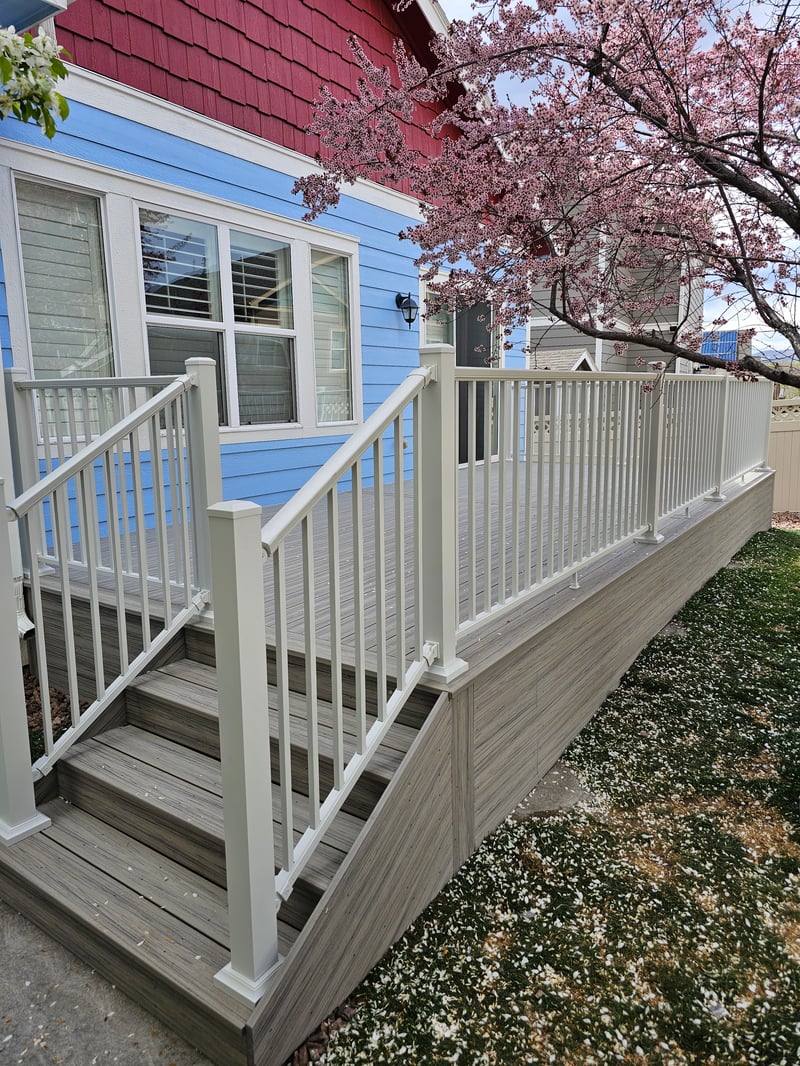 Multi-level custom wood deck with railings in Colorado Springs