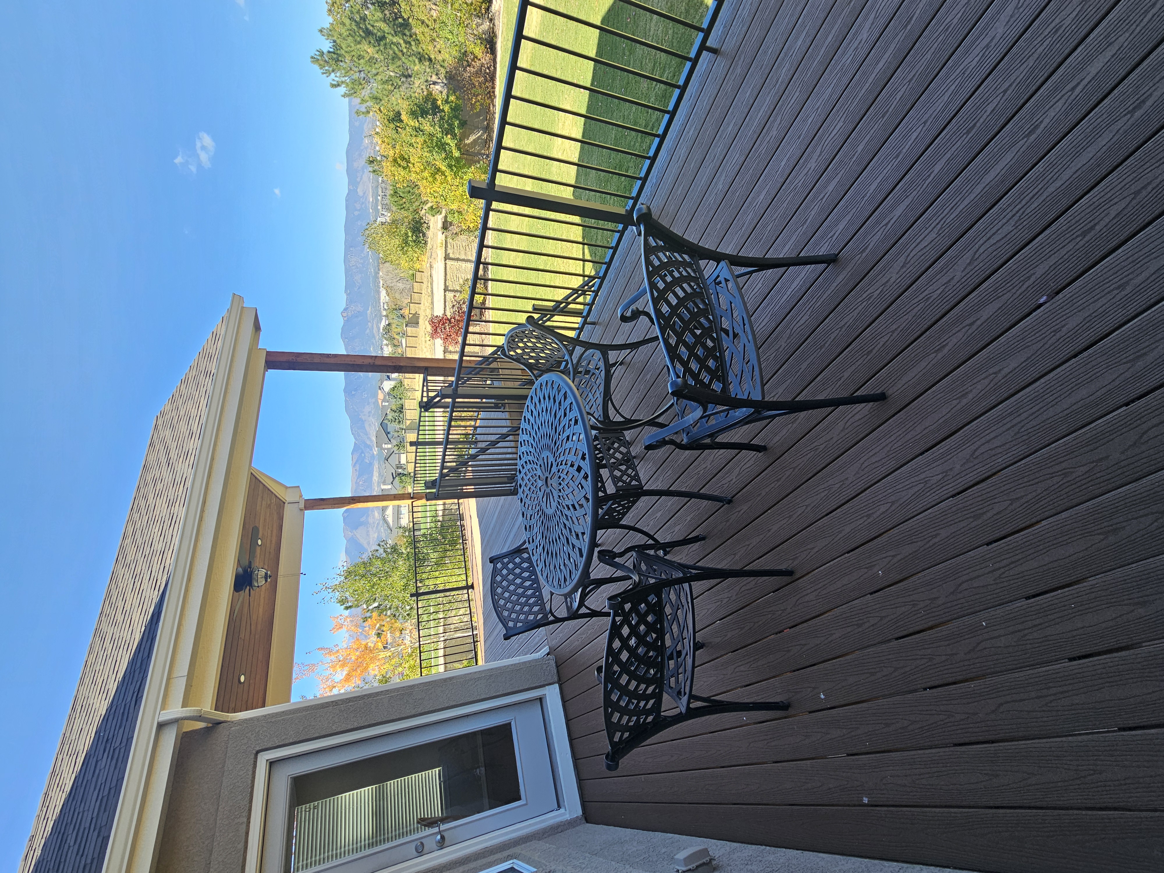 Covered outdoor kitchen and dining deck
