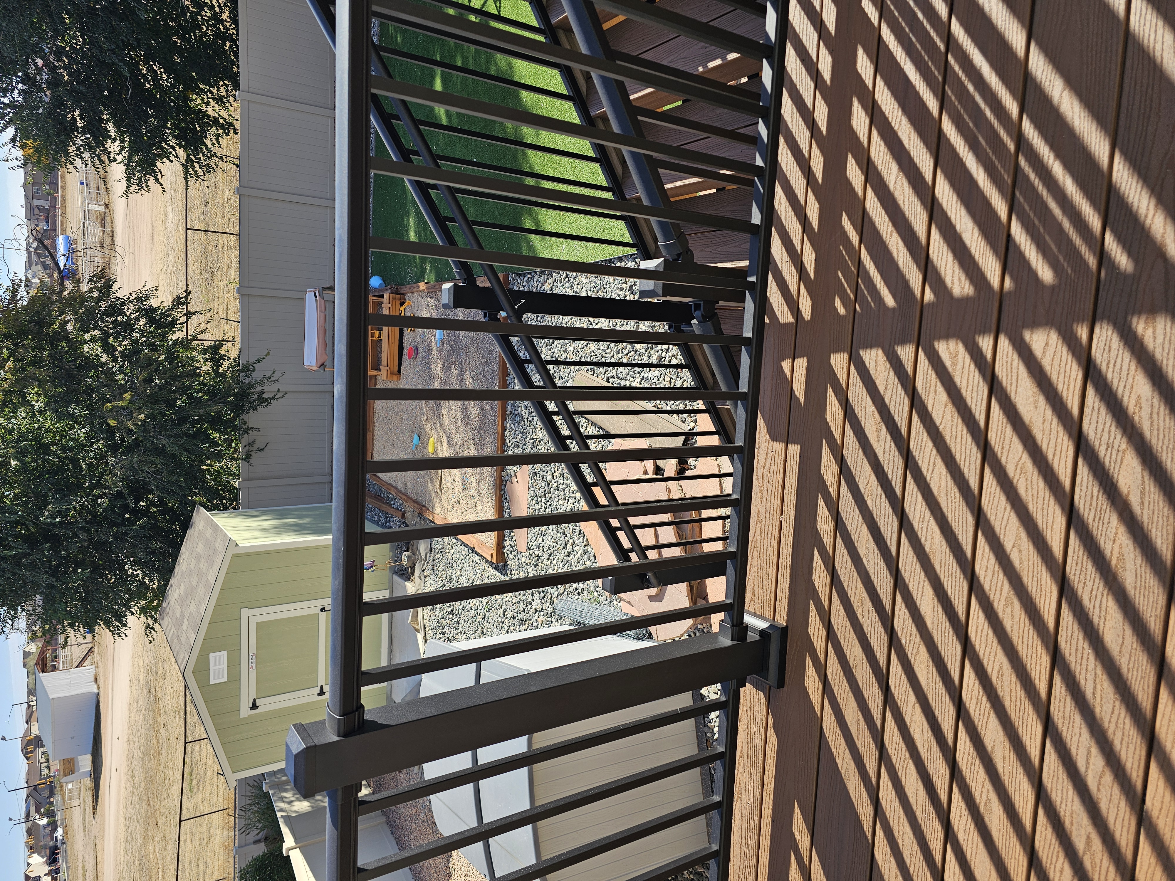 Covered outdoor kitchen and dining deck