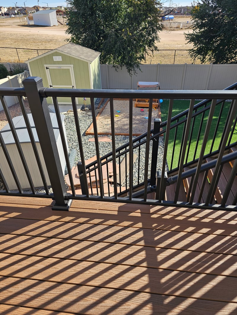 Covered outdoor kitchen and dining deck