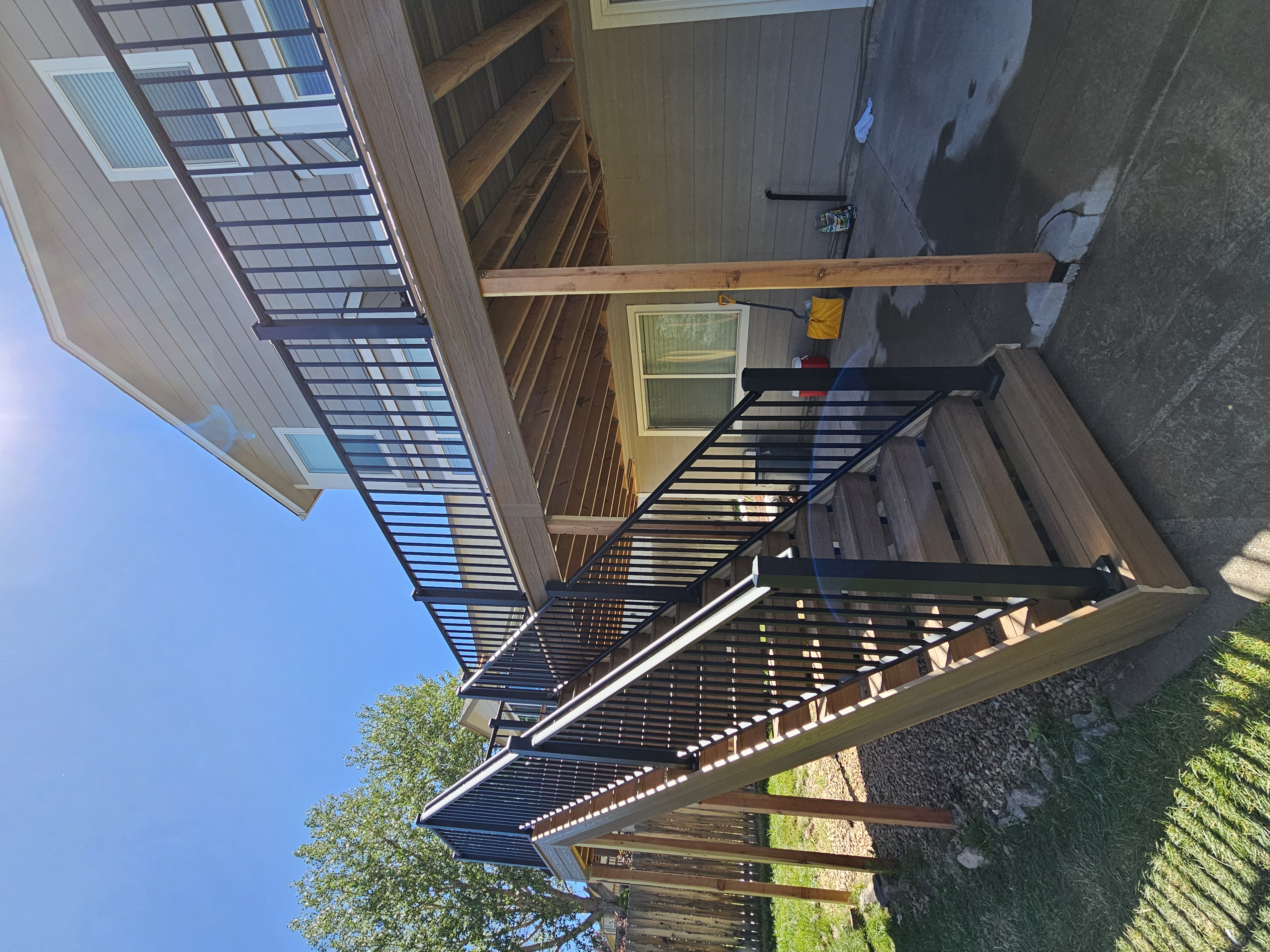 Finished composite deck with picture-frame border detail