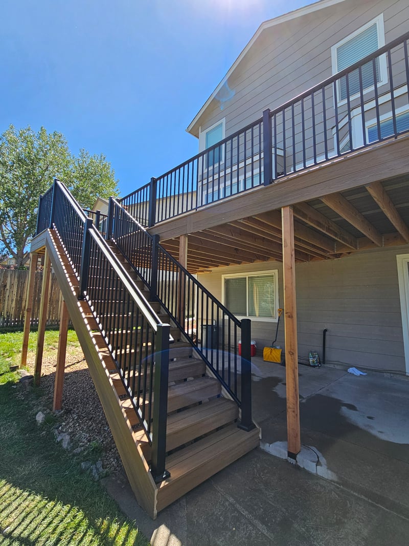Finished composite deck with picture-frame border detail