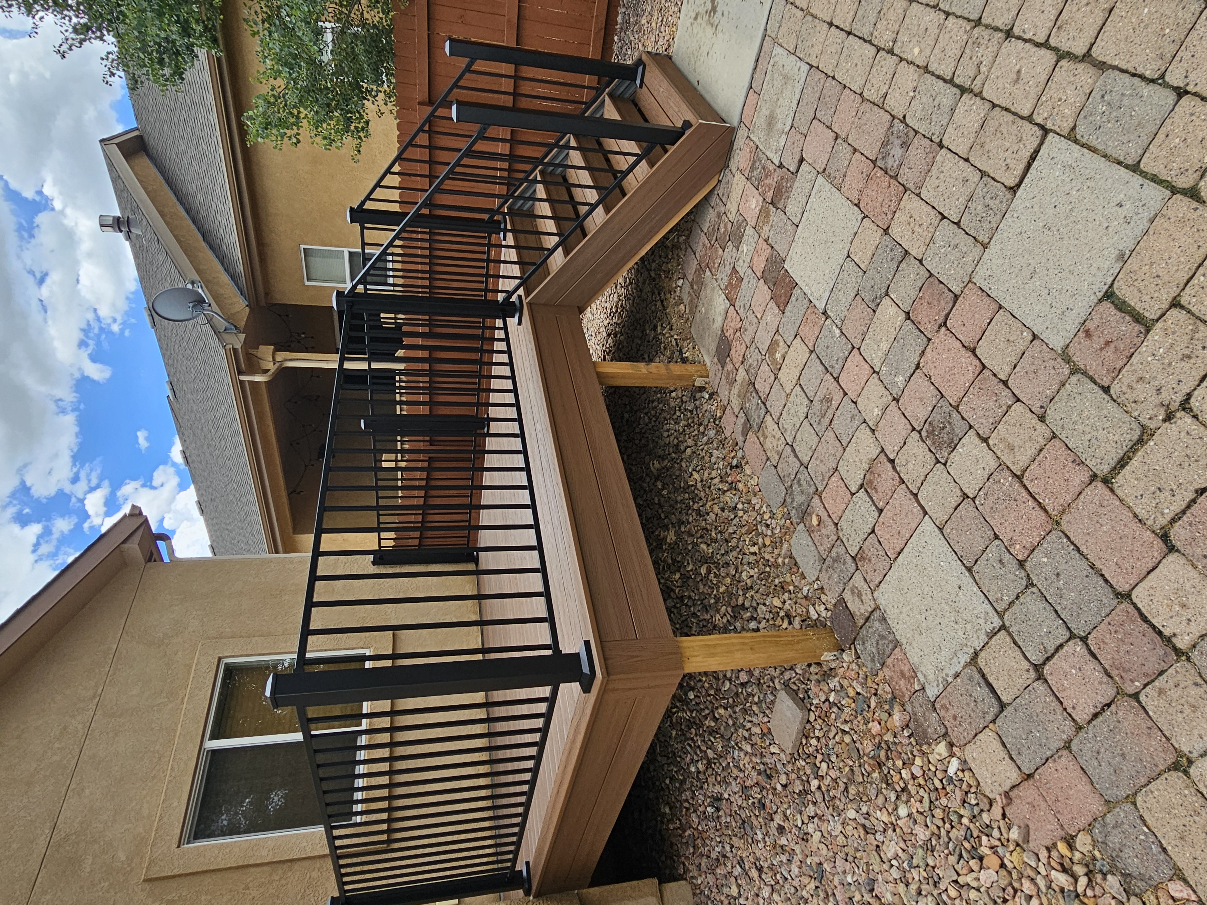 Covered outdoor kitchen and dining deck