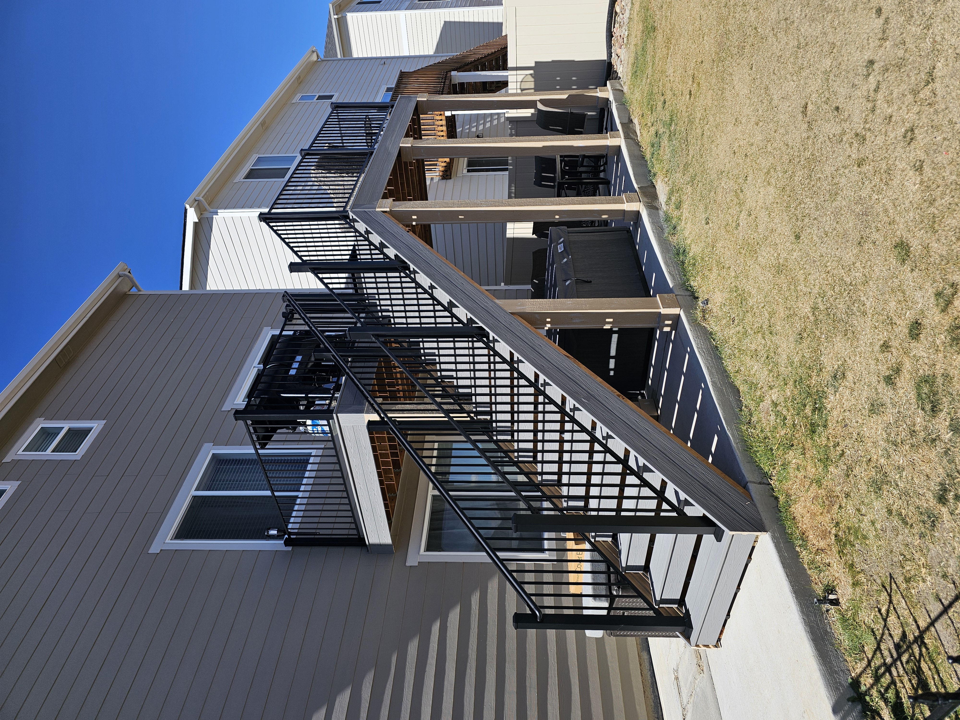 Deck stairs with landing and matching railings