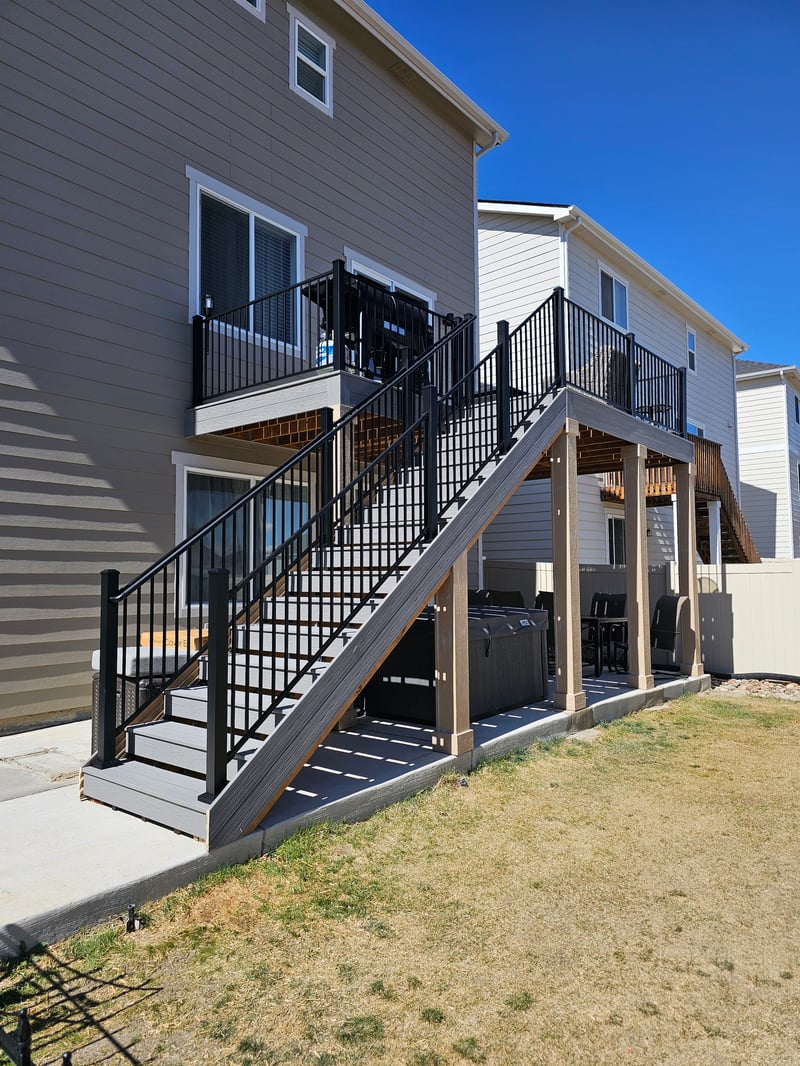 Deck stairs with landing and matching railings