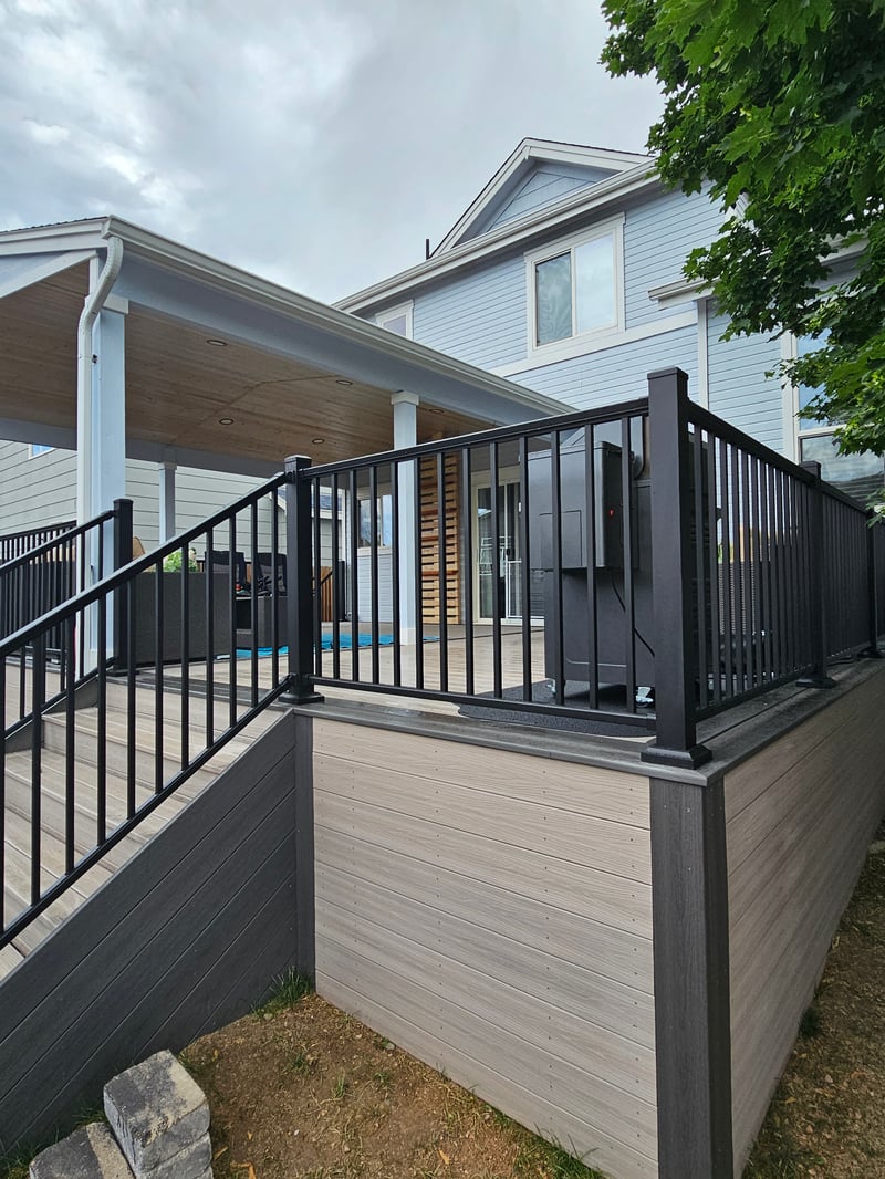Deck stairs with landing and matching railings