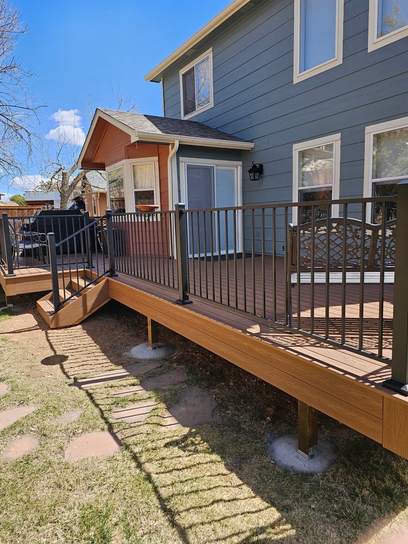 Custom cedar pergola over a backyard deck in the Pikes Peak region