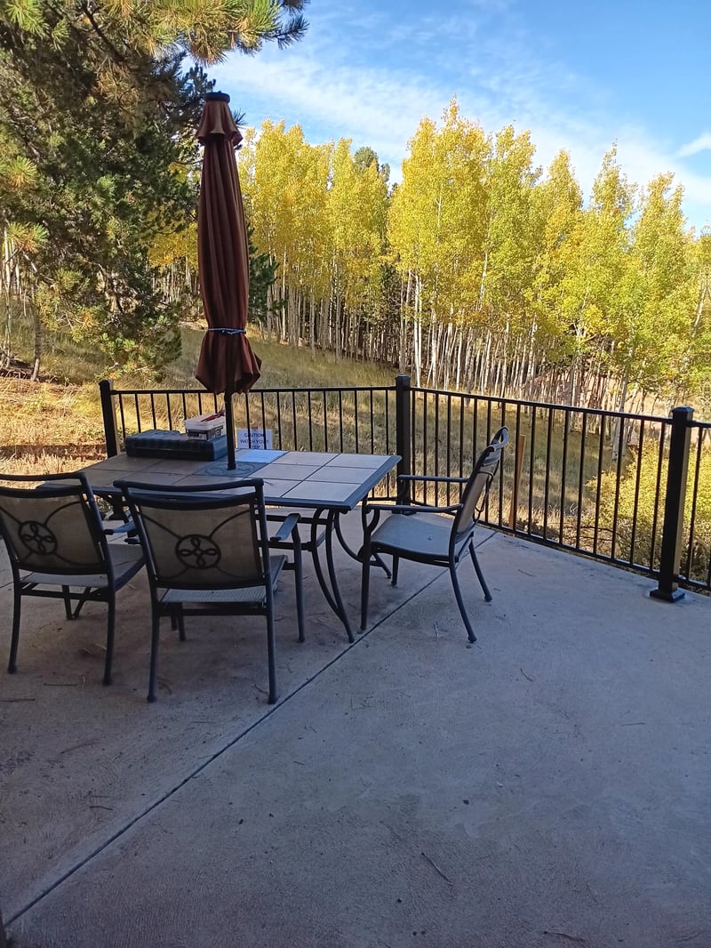 Covered outdoor kitchen and dining deck