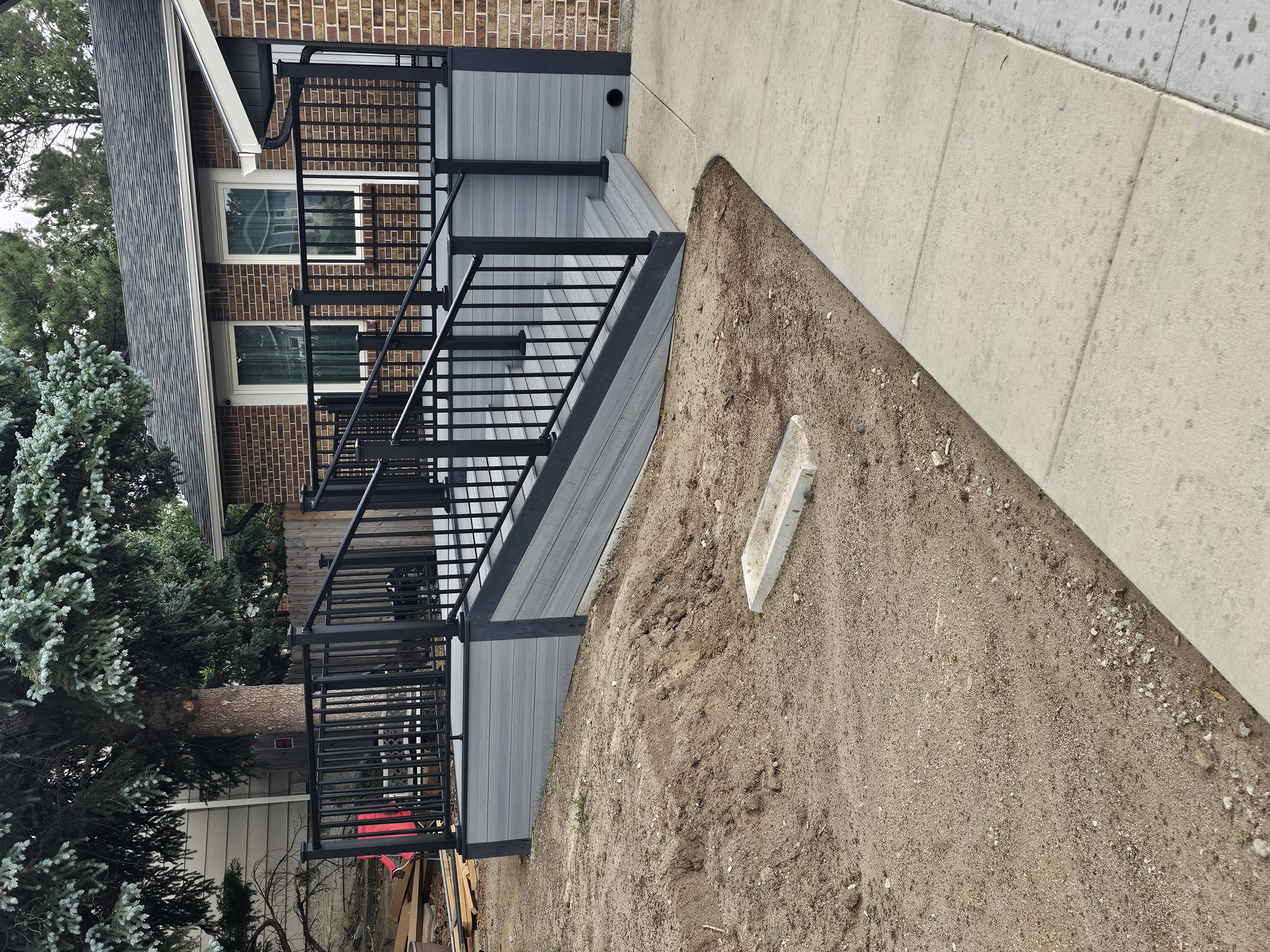 Finished composite deck with picture-frame border detail