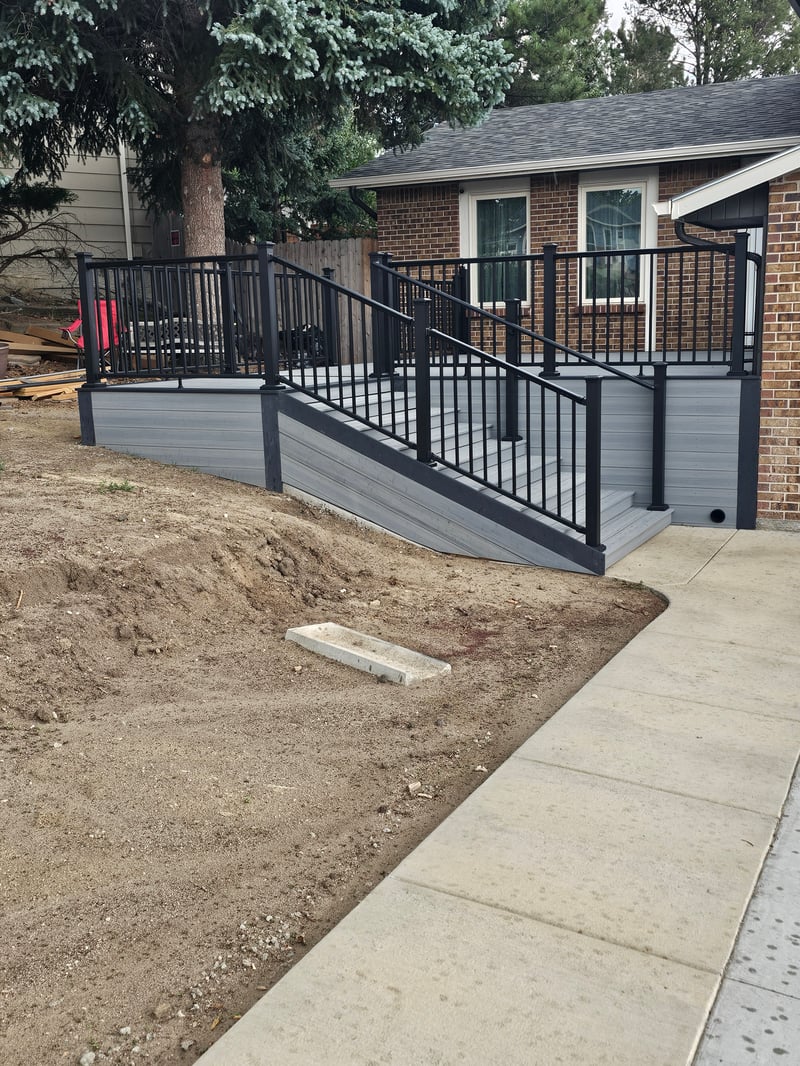 Finished composite deck with picture-frame border detail
