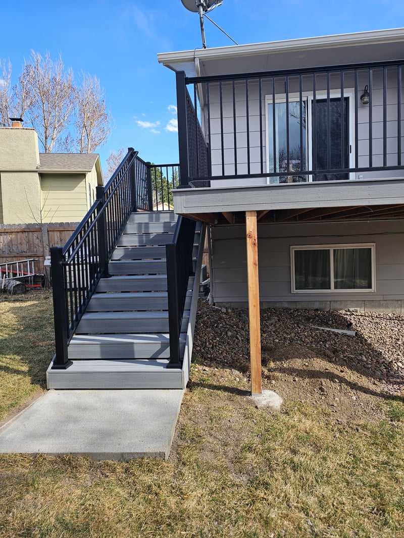 Deck stairs with landing and matching railings