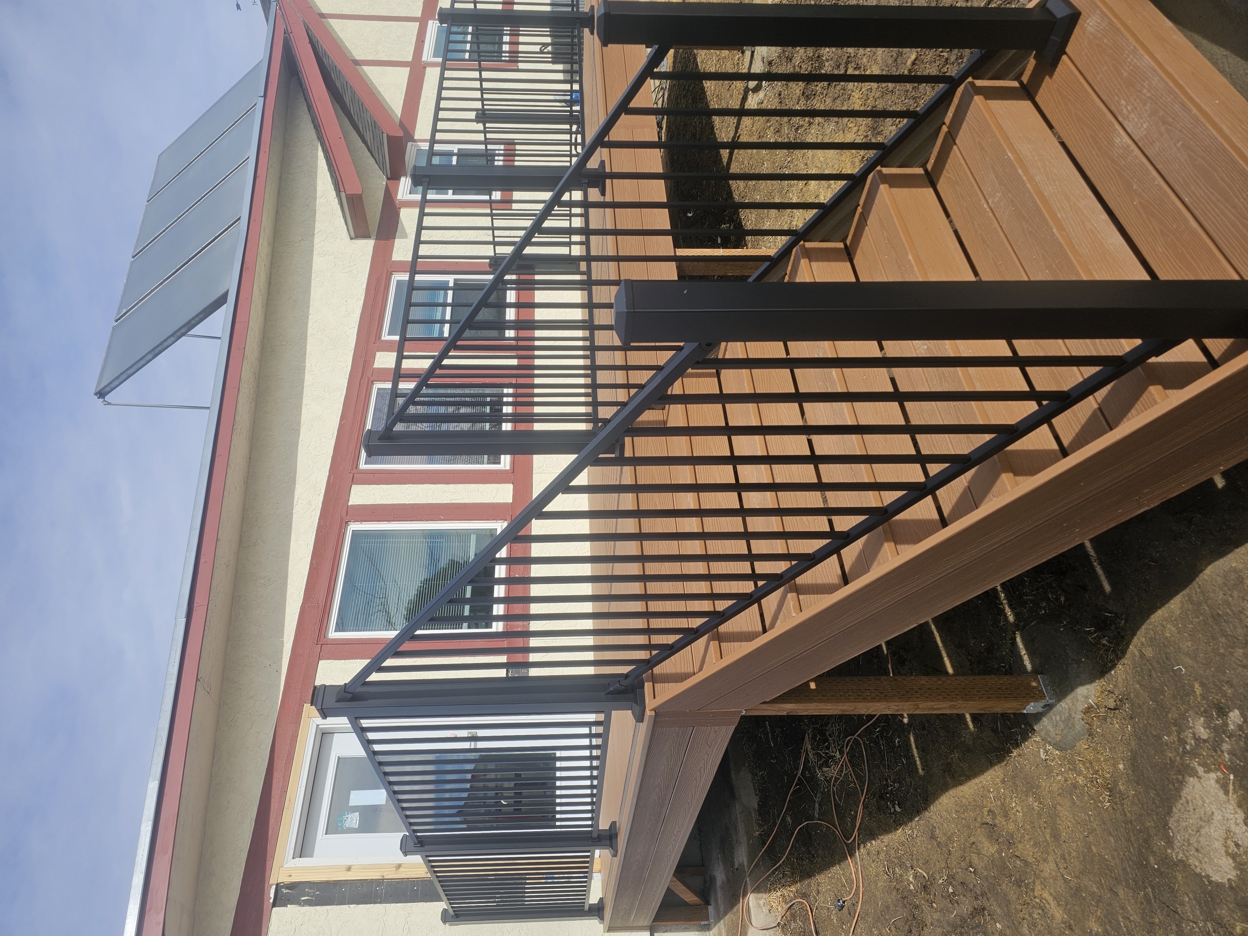 Finished composite deck with picture-frame border detail
