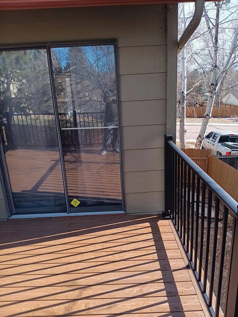 Covered patio and outdoor living space attached to a Colorado Springs home
