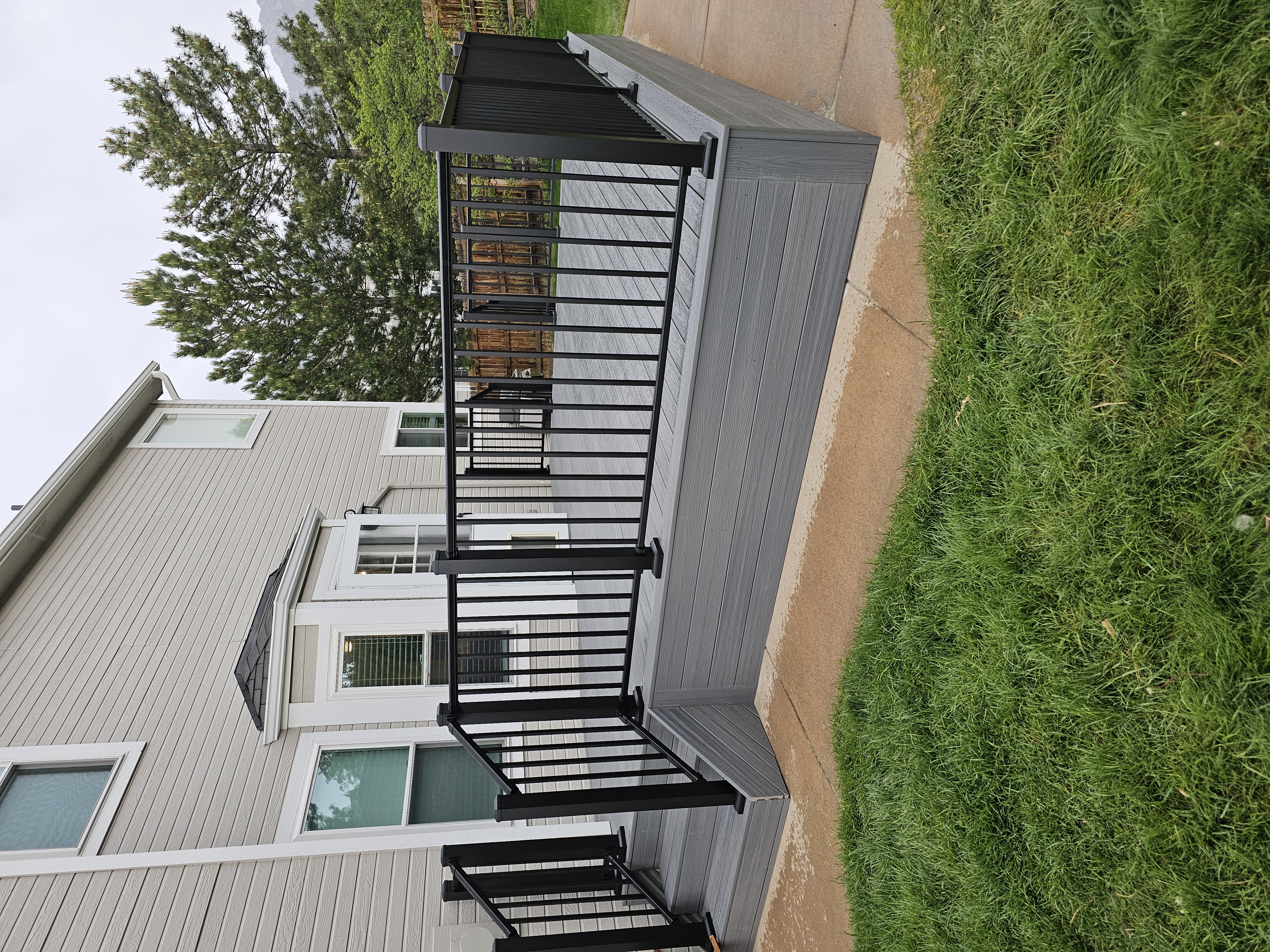 Finished composite deck with picture-frame border detail