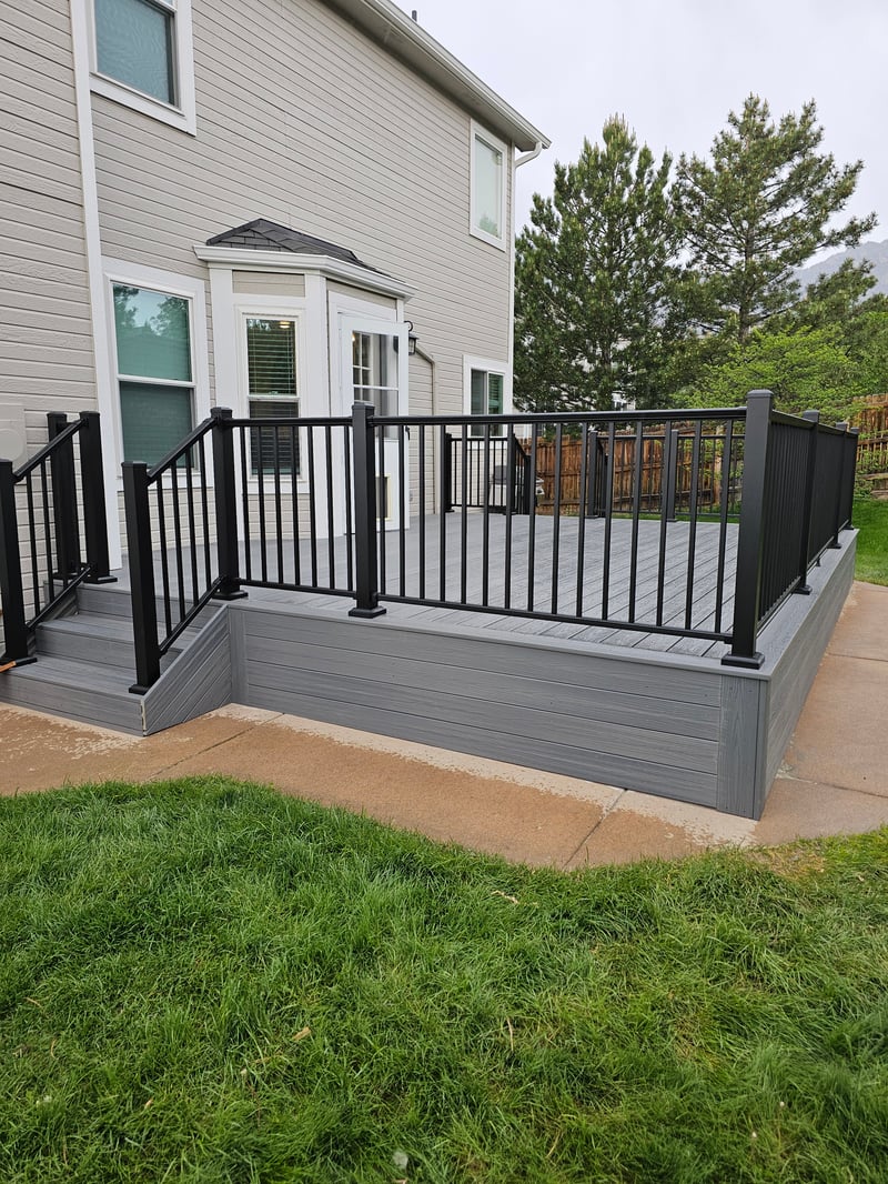 Finished composite deck with picture-frame border detail