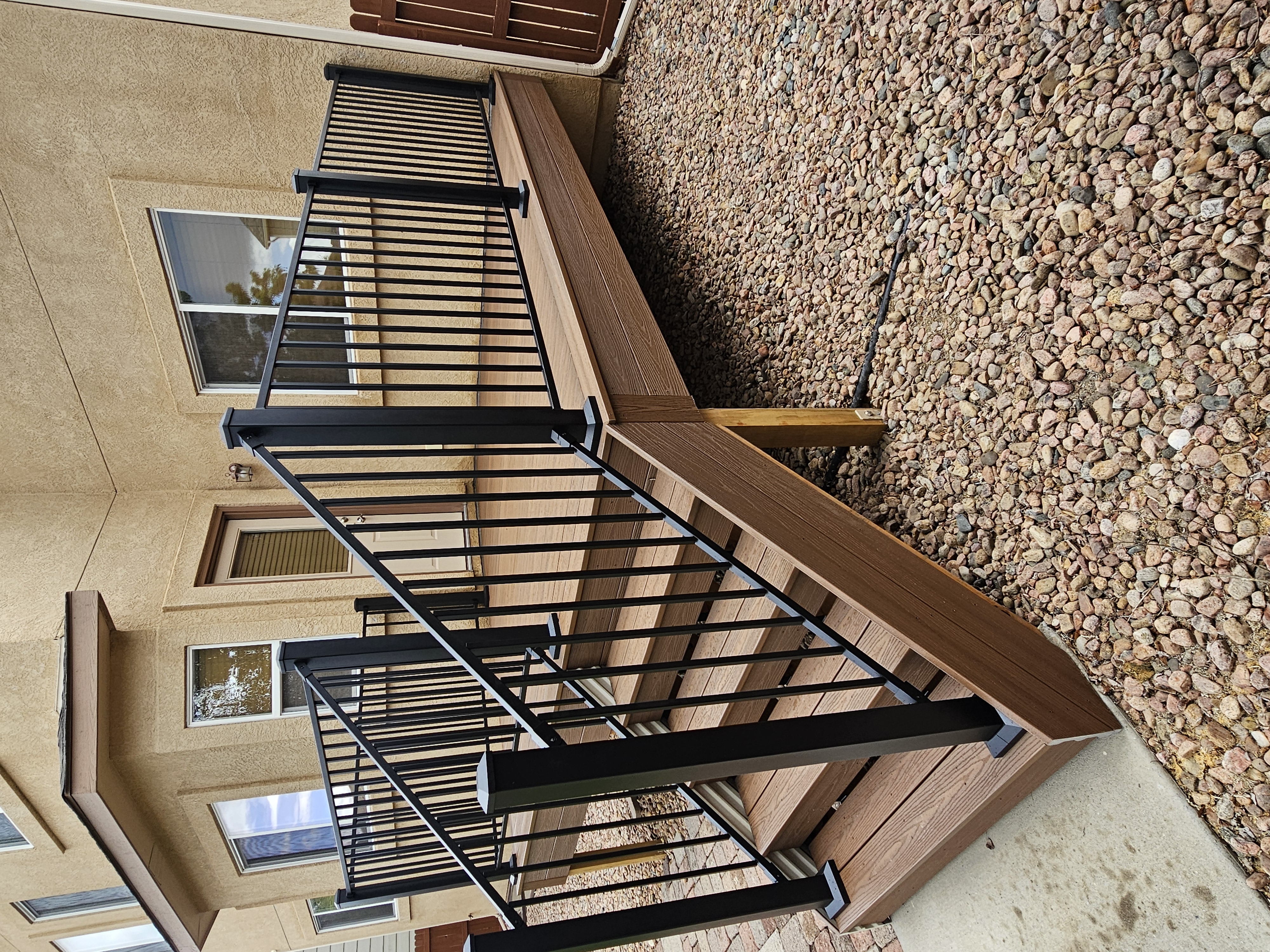 Deck stairs with landing and matching railings