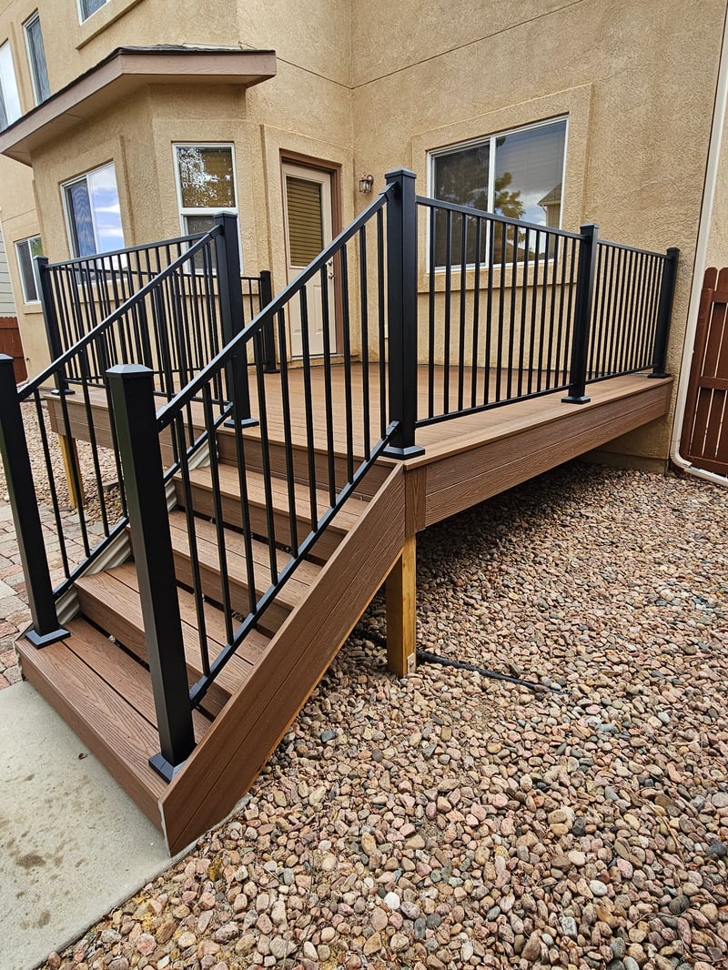 Deck stairs with landing and matching railings