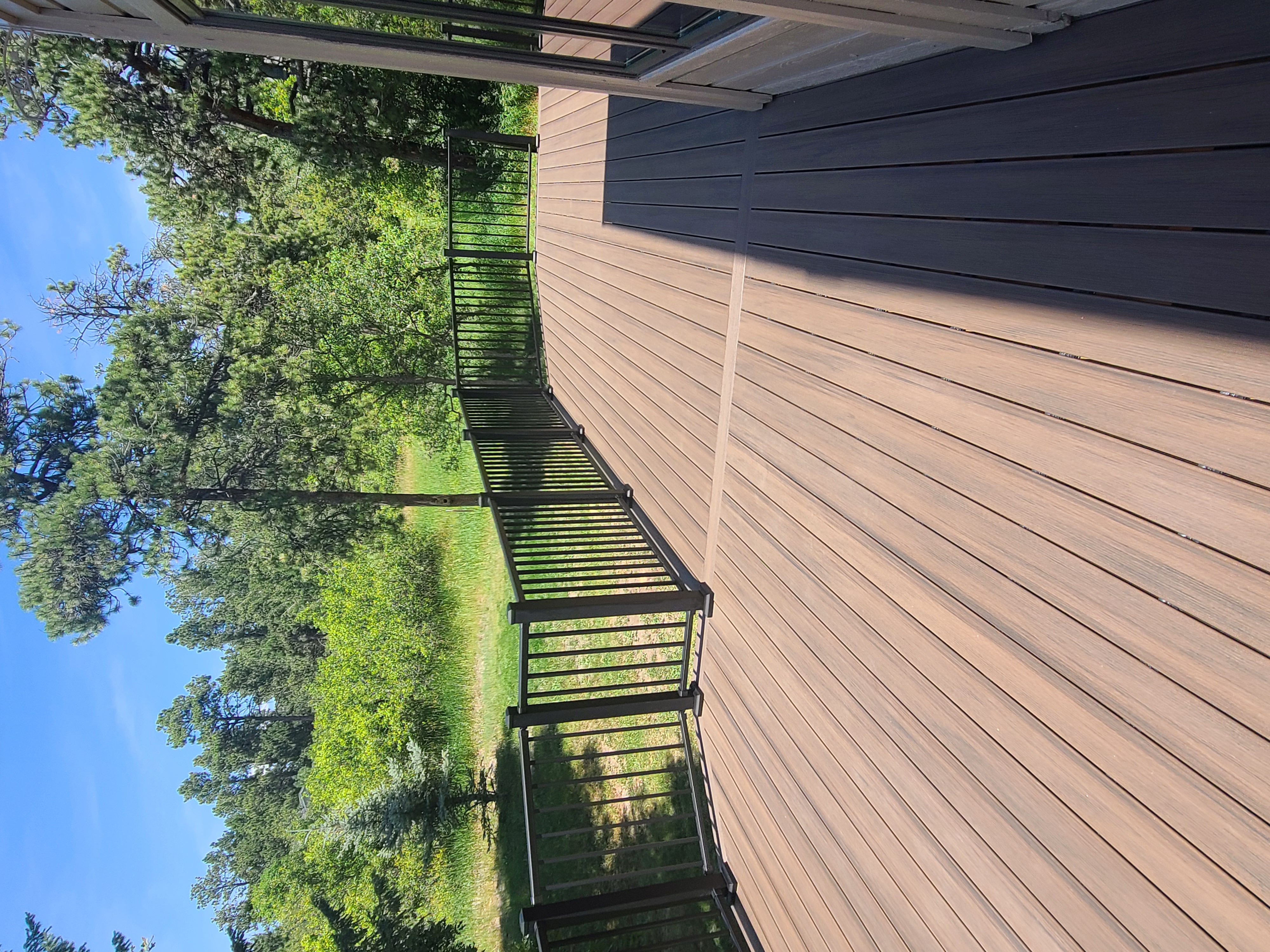 Wraparound custom deck with built-in bench seating