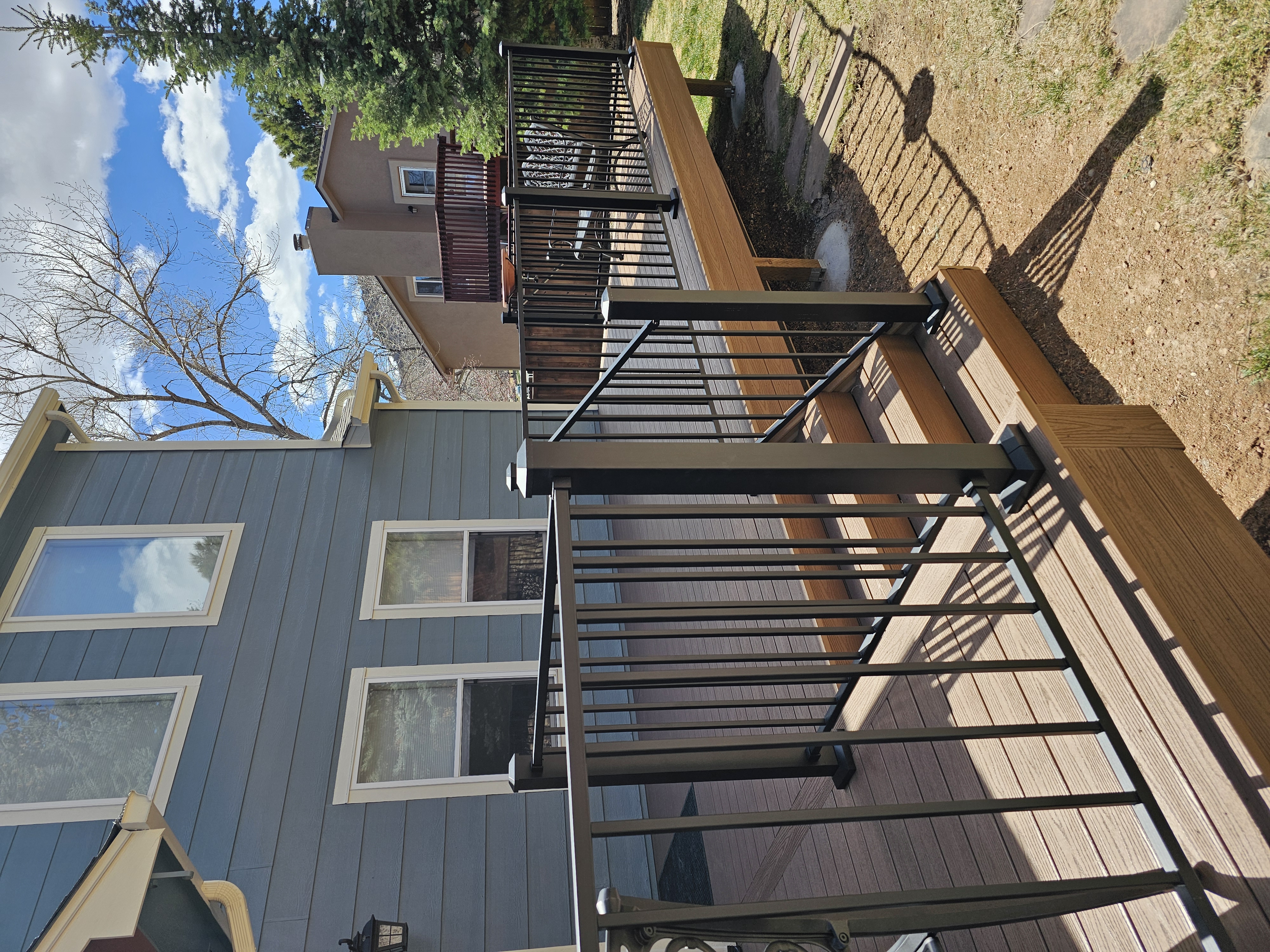 Wraparound custom deck with built-in bench seating