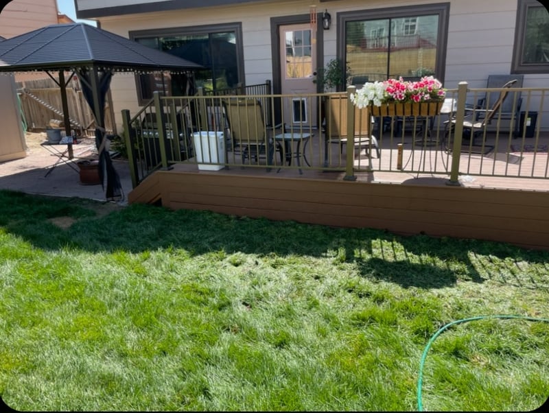 Backyard deck with pergola and outdoor dining area