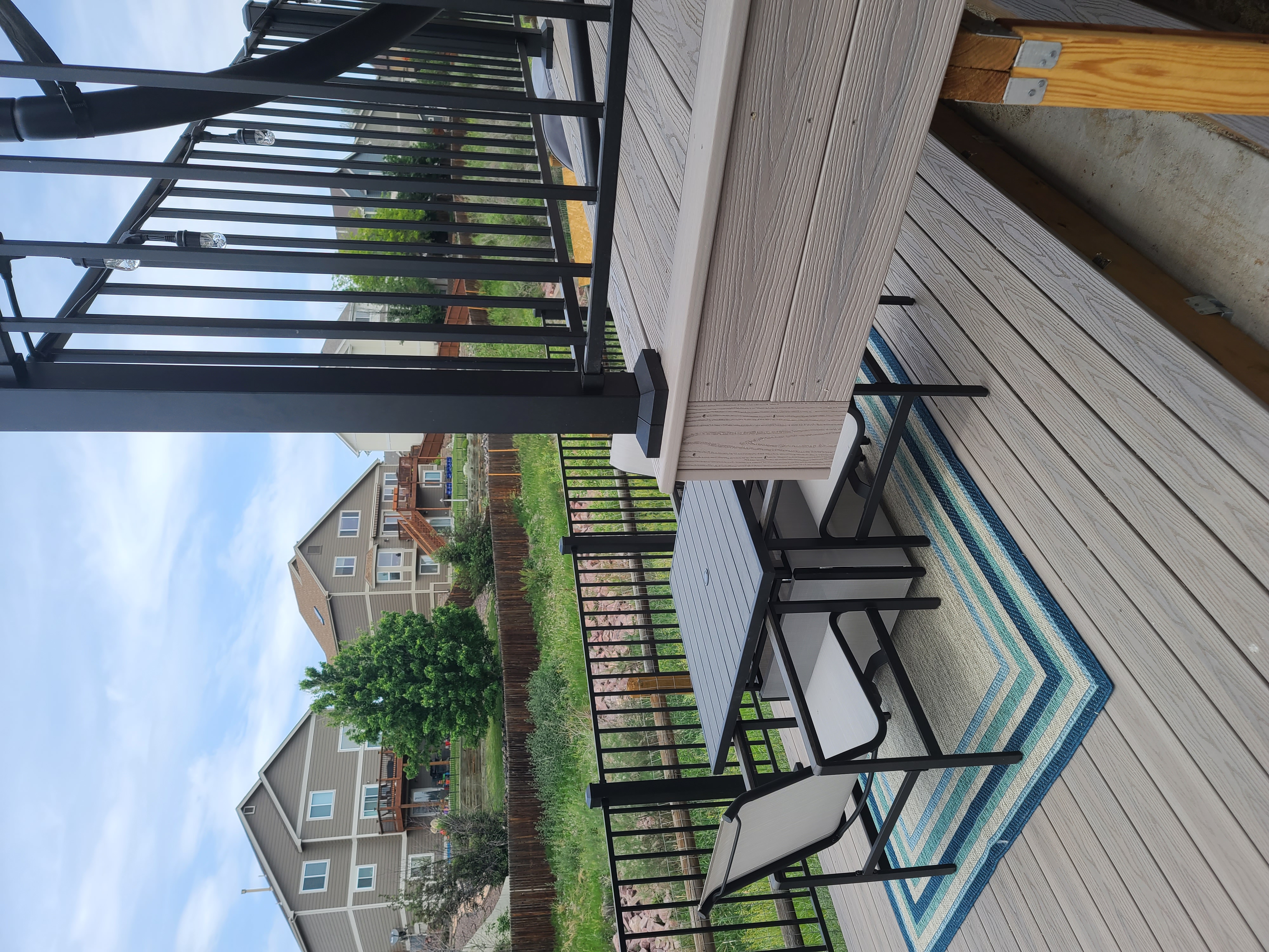 Covered outdoor kitchen and dining deck