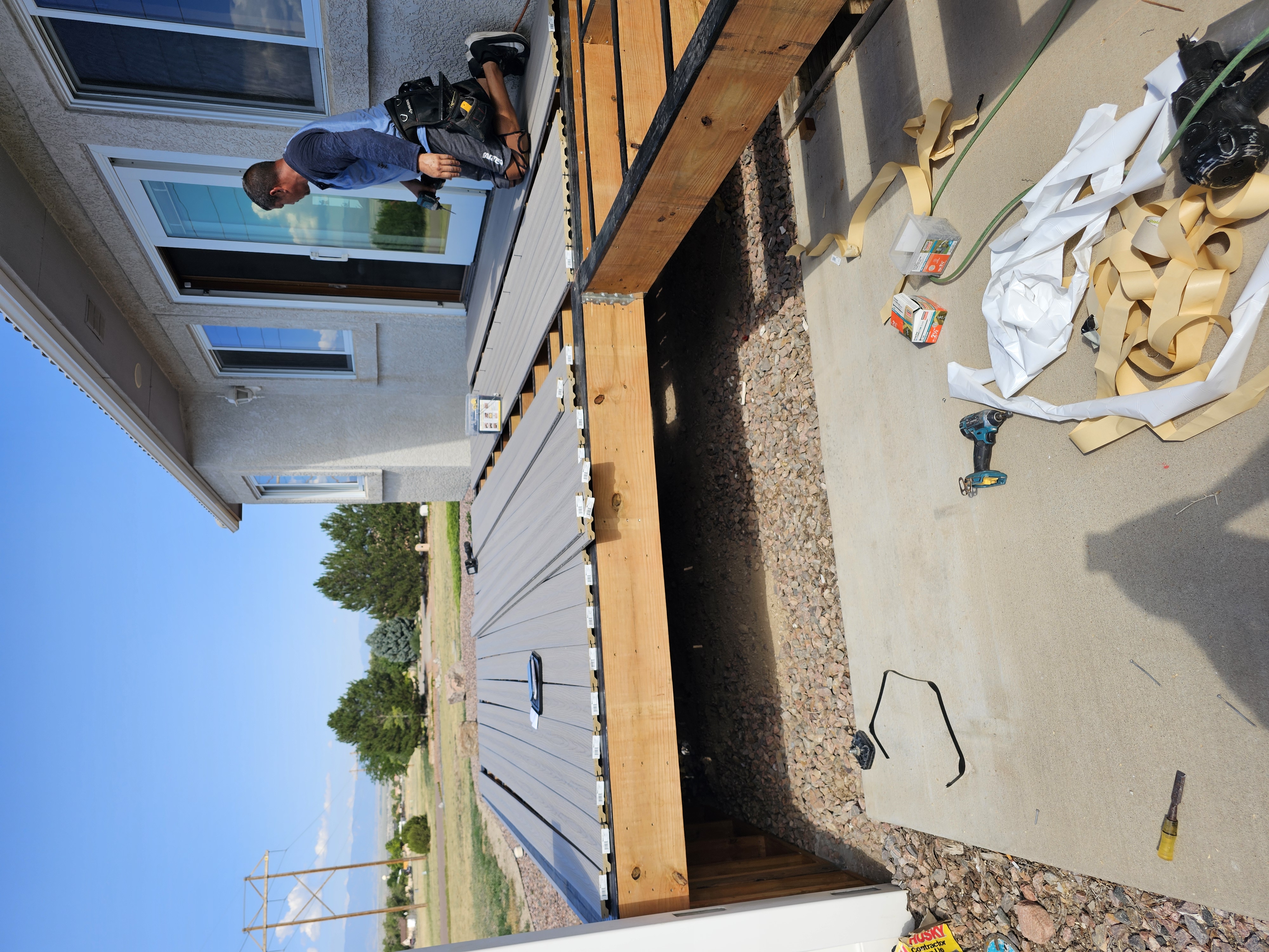 Deck stairs with landing and matching railings