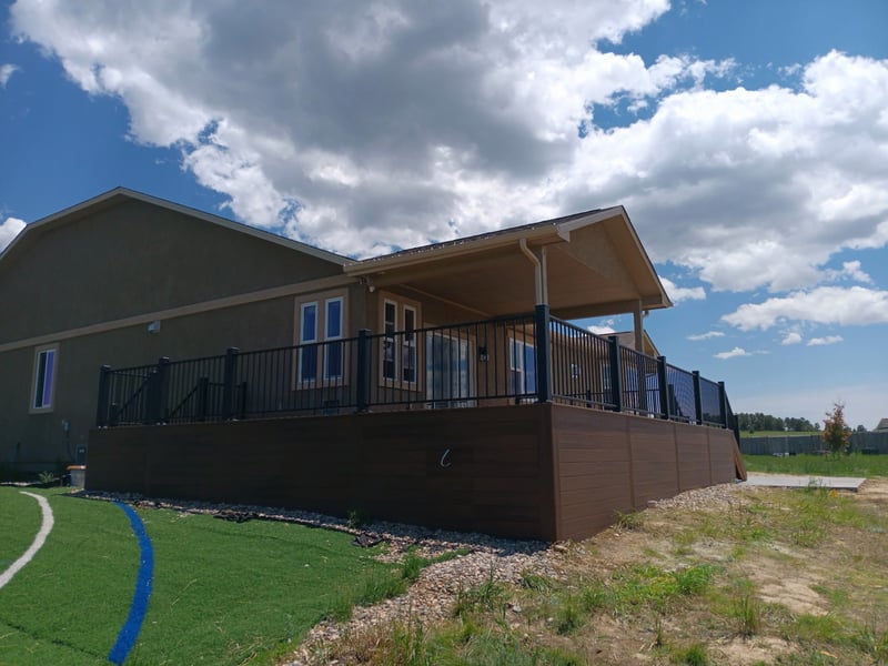 Covered outdoor kitchen and dining deck