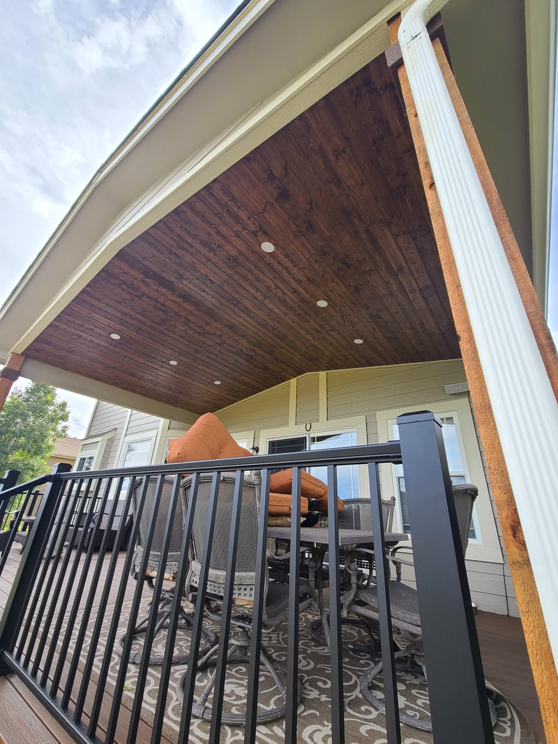 Multi-level custom wood deck with railings in Colorado Springs